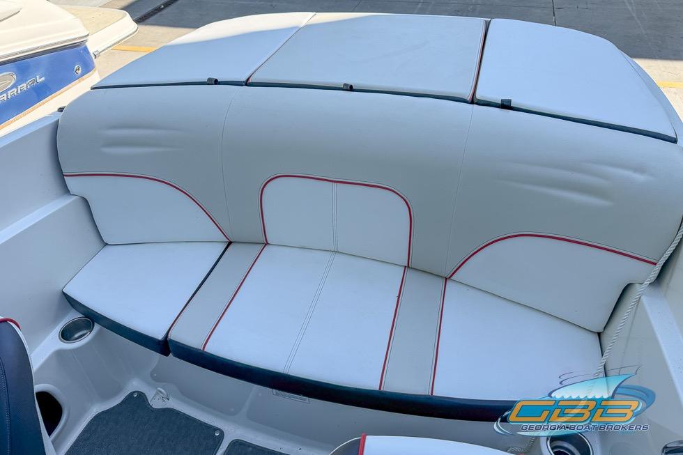 2014 Sea Ray 190 Sport boat interior with white and red-trimmed seating.