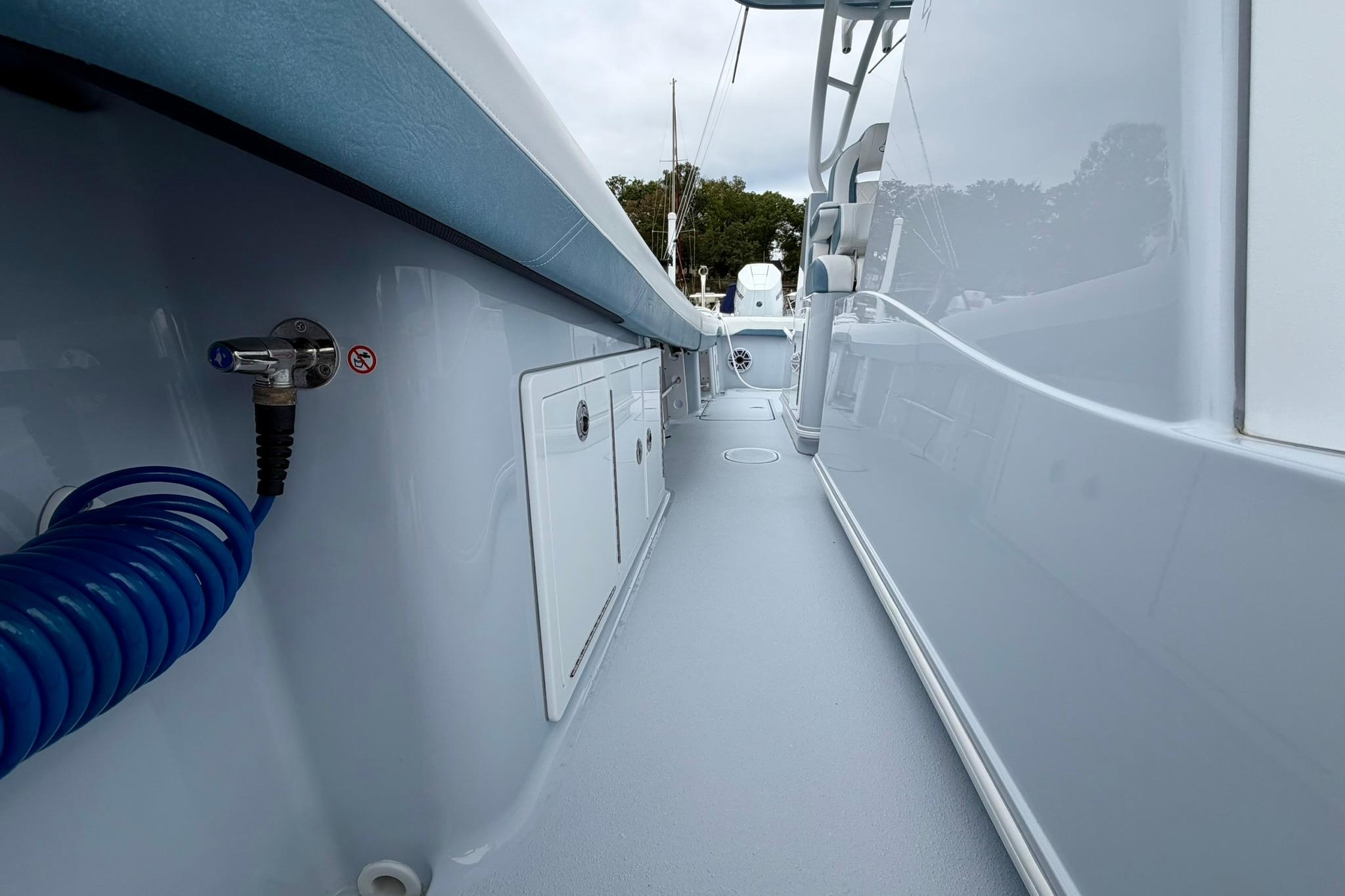 2025 Yellowfin 36 Offshore boat interior with sleek design and storage compartments.