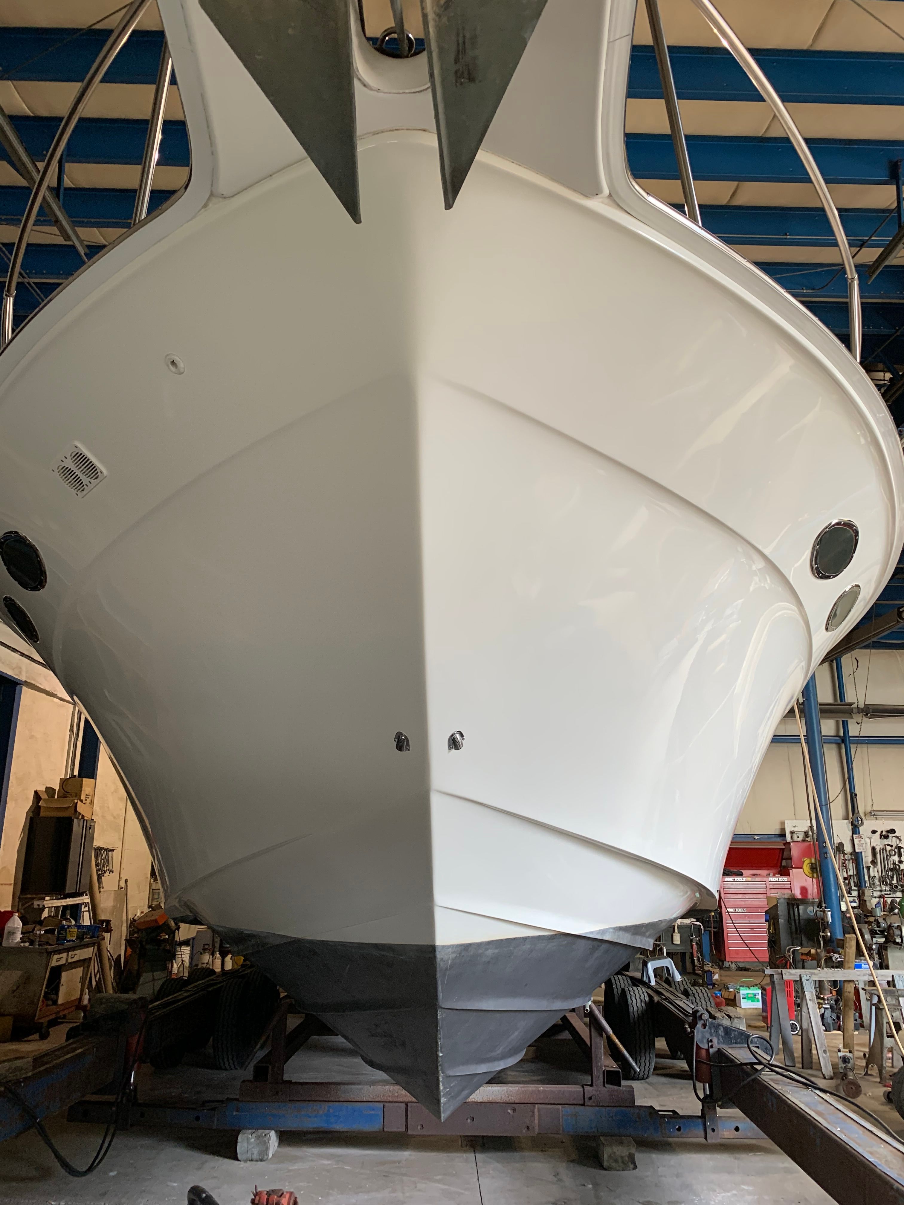 1998 Sea Ray 37 EC boat in dry dock, front view.