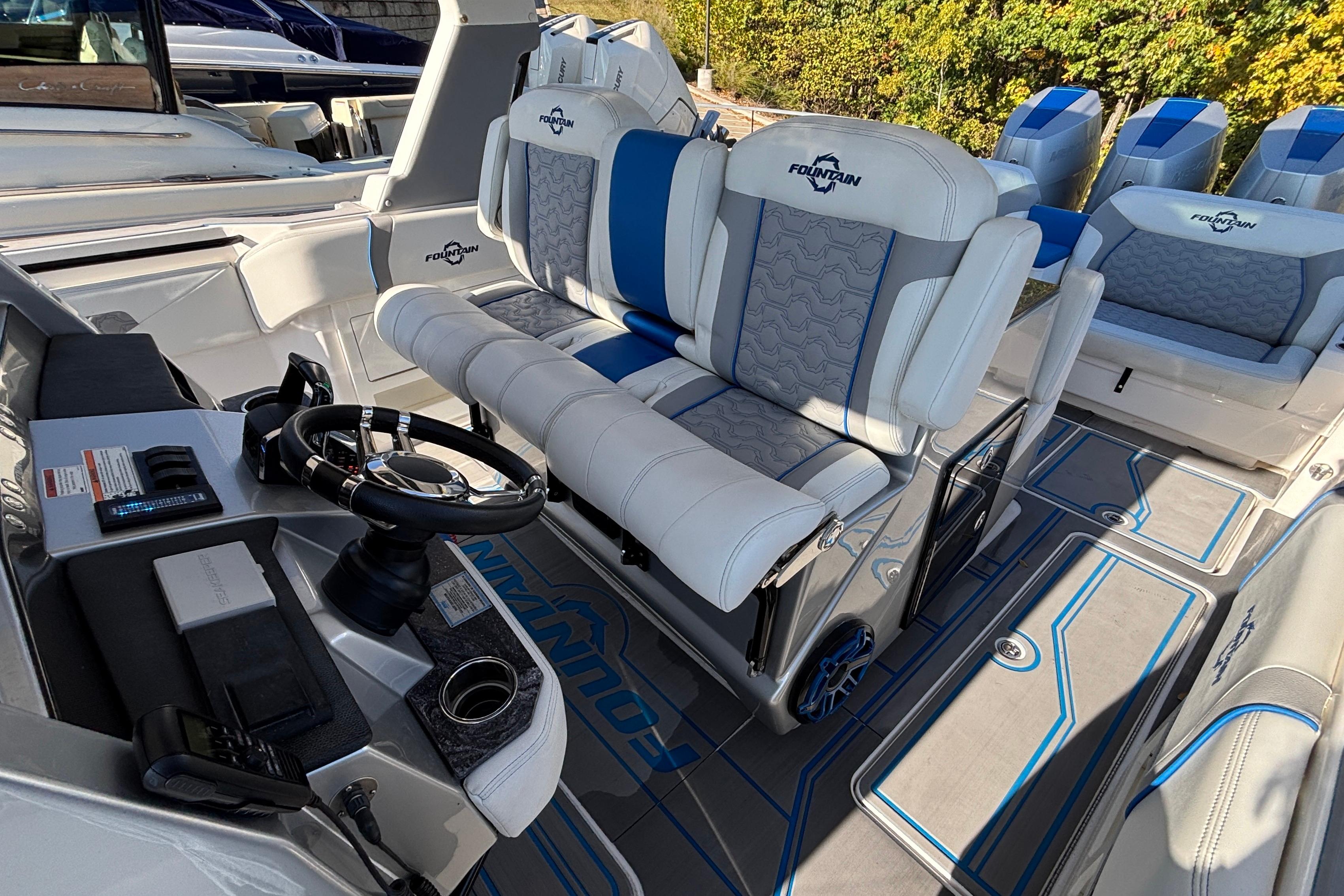 2024 Fountain 38 SCX boat interior with luxury seating and modern steering console.