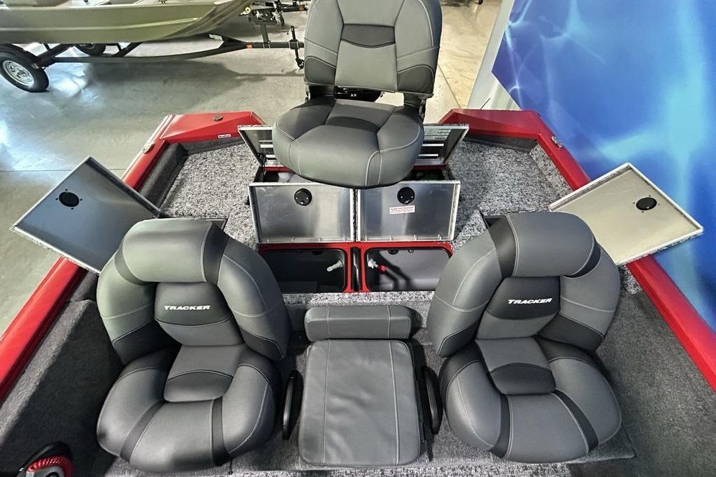 2026 Tracker Pro Team 195 boat interior with cushioned seats and storage compartments.