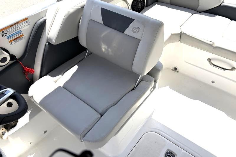 2026 Hurricane SunDeck Sport 2050 OB boat interior with gray seating and cup holder.