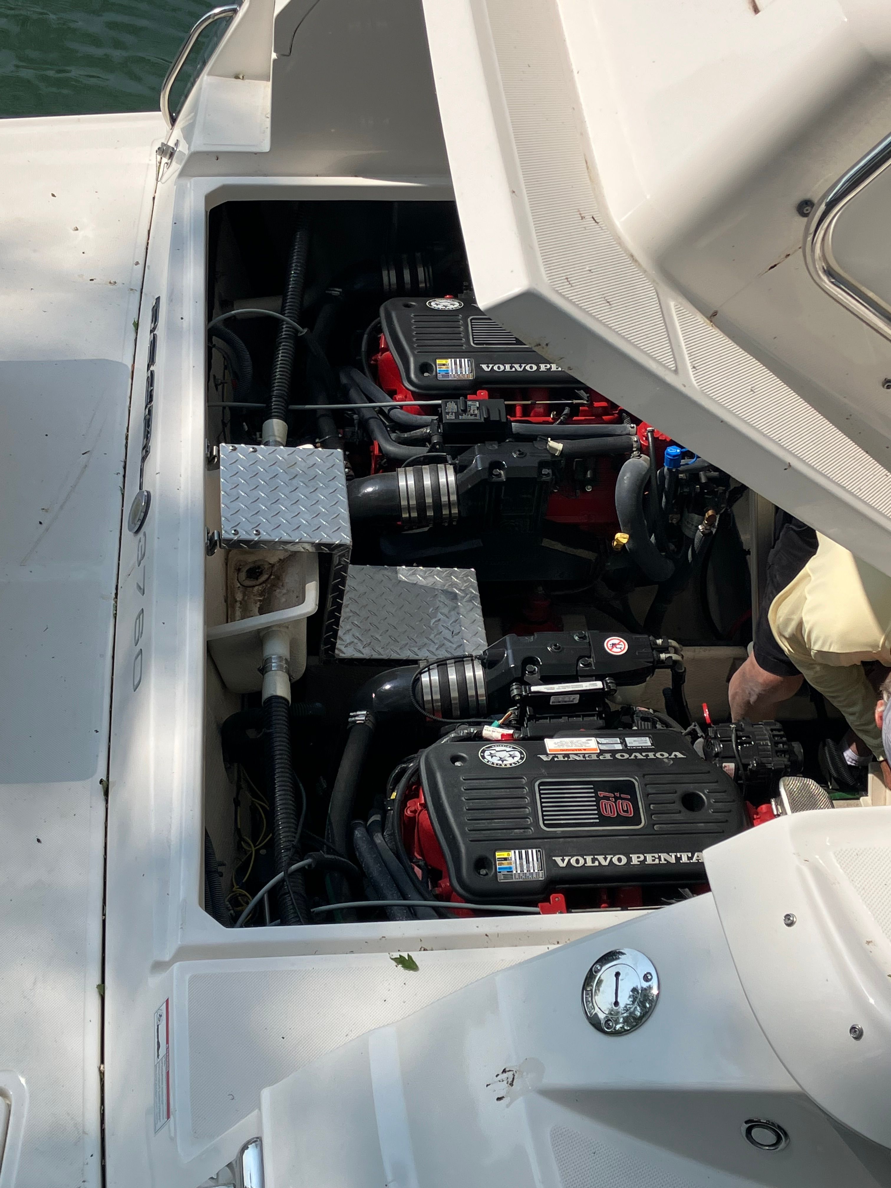 Engine compartment of a 2008 Custom Commodore boat with Volvo Penta engines.