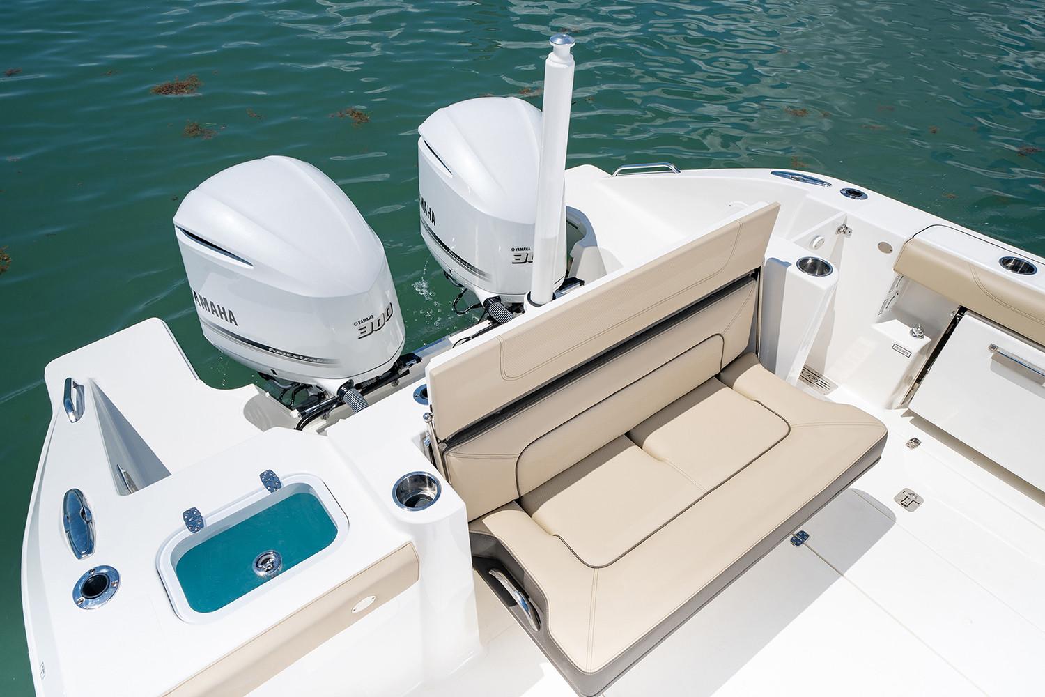 Pursuit DC 326 Dual Console 2021 with Yamaha engines on water.