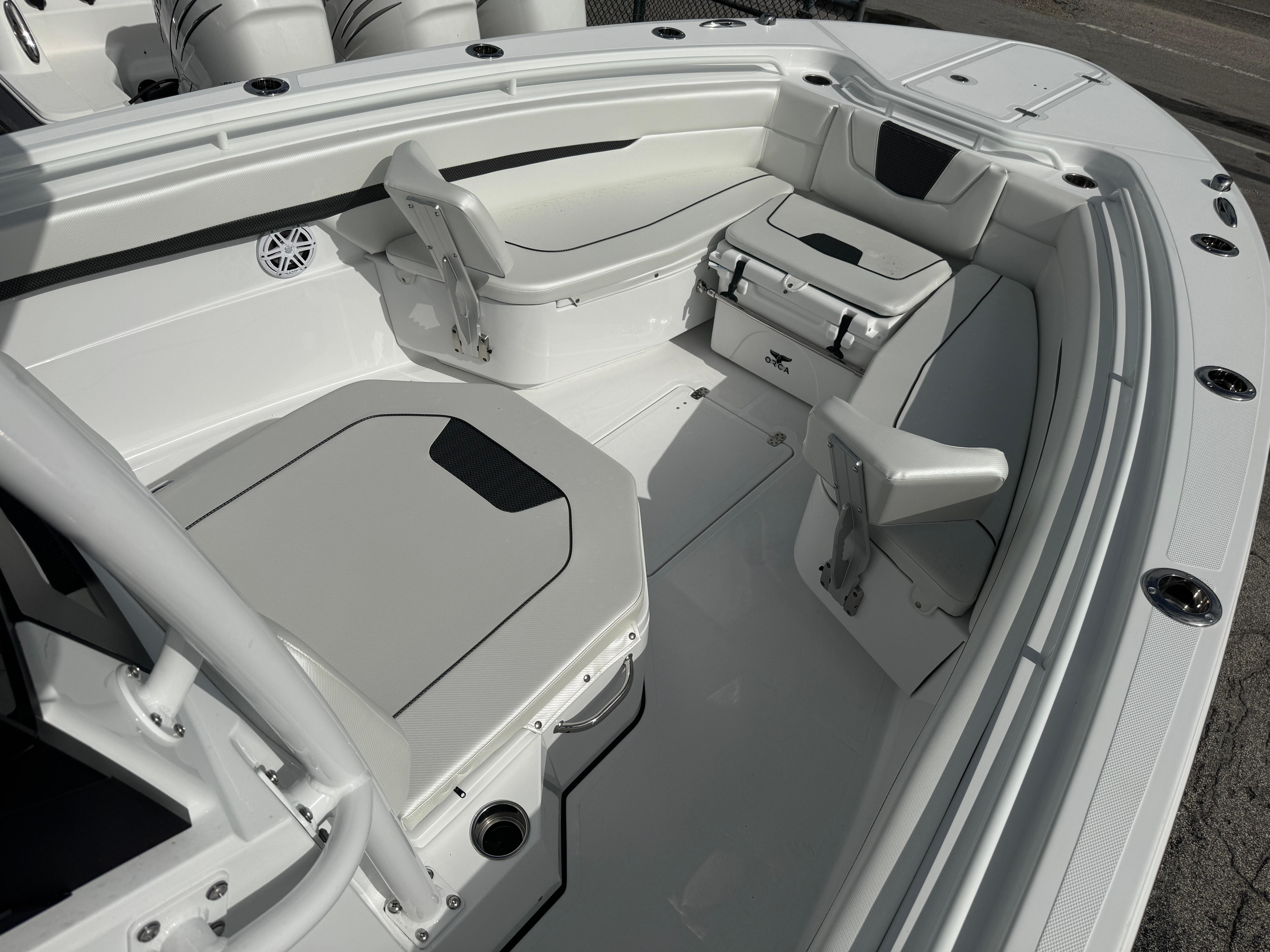 2025 Wellcraft 302 Fisherman boat interior with seating and storage.