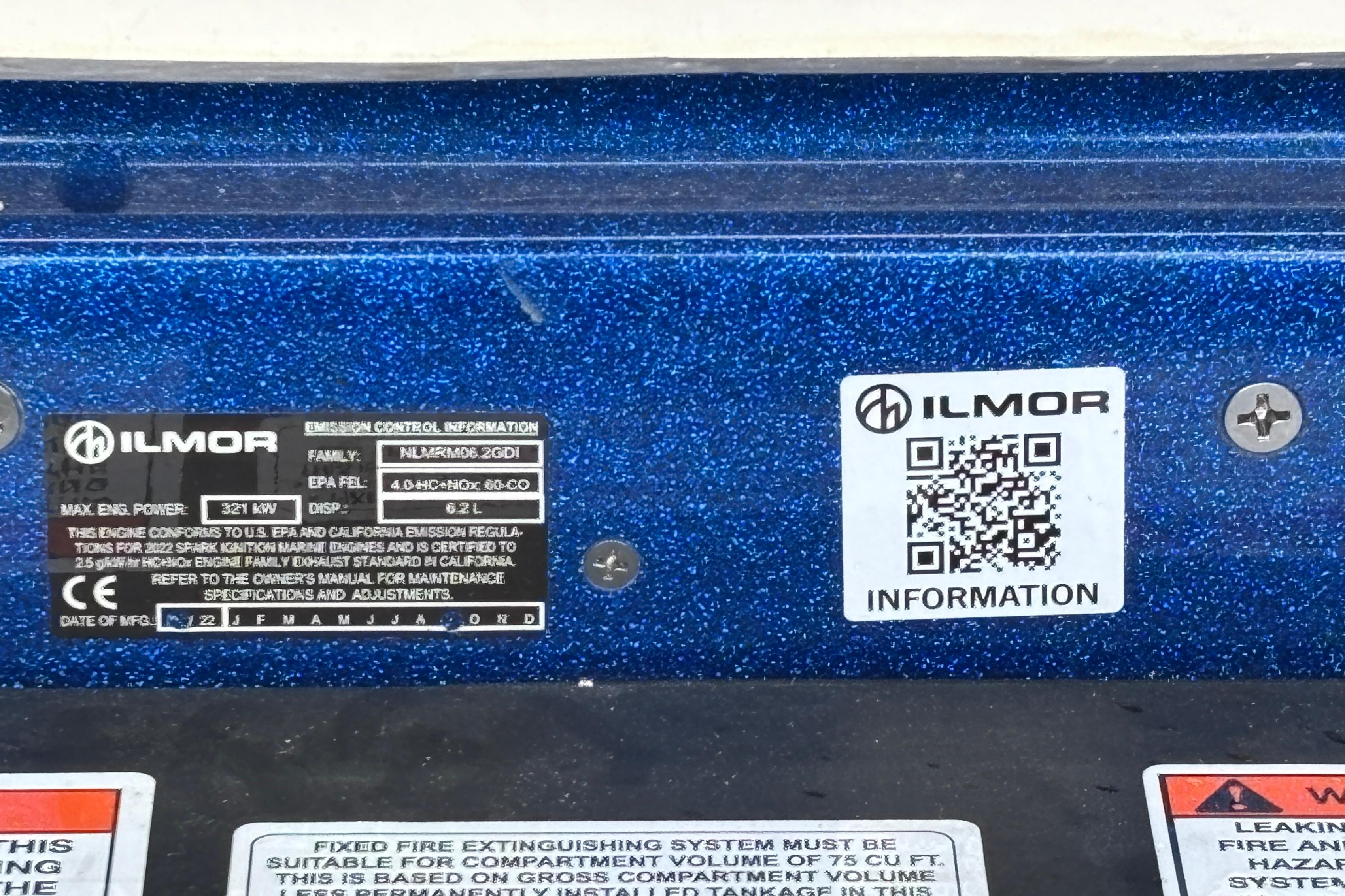 QR code and engine information on 2022 MasterCraft X26 boat, Ilmor engine details visible.