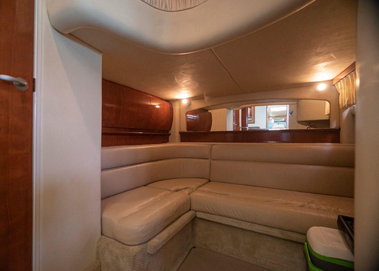 Luxurious interior of 2006 Sea Ray 440 Sundancer yacht with plush seating.