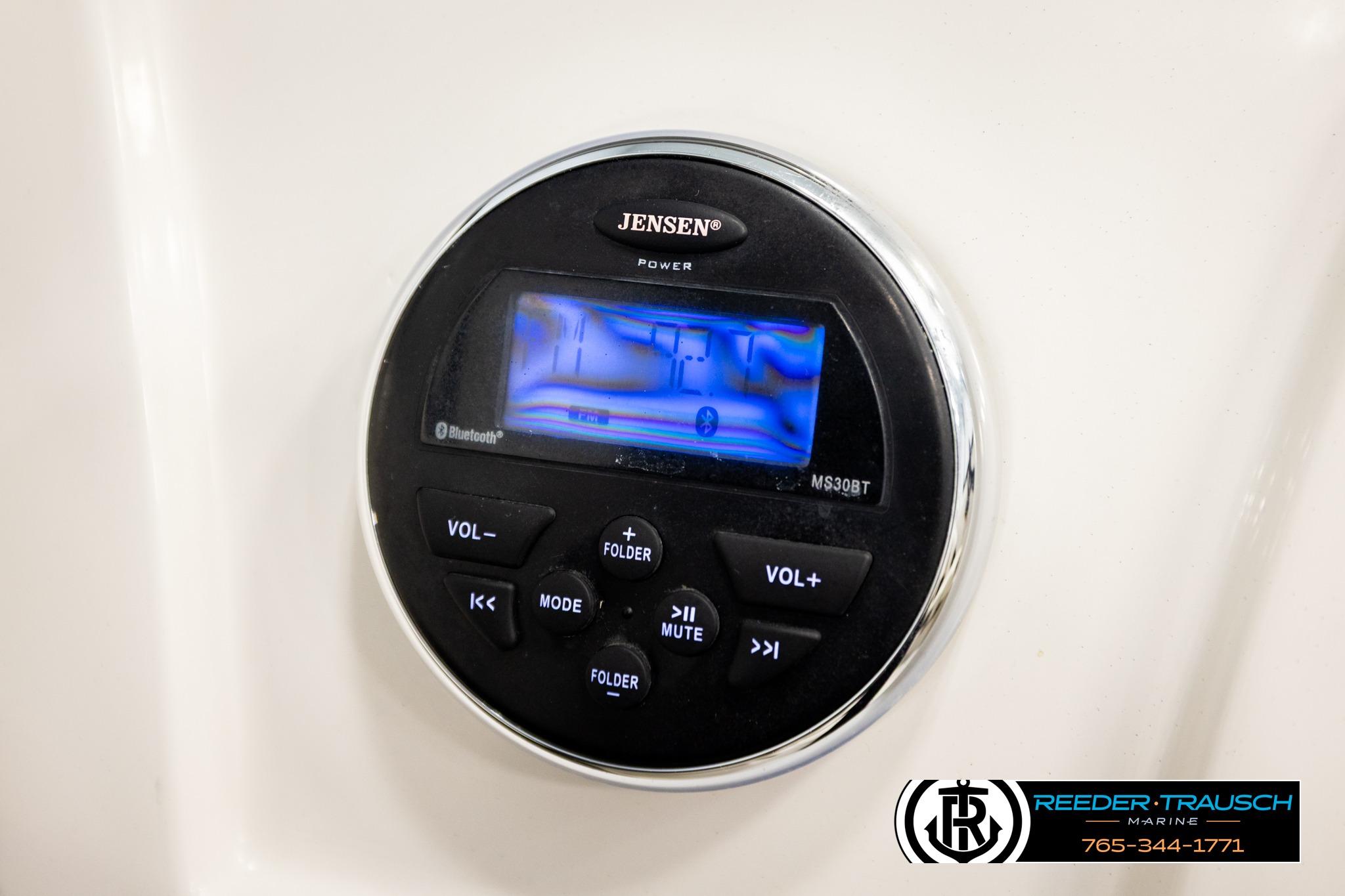 Jensen stereo system on 2016 Tahoe 450 TS boat dashboard, featuring Bluetooth connectivity.