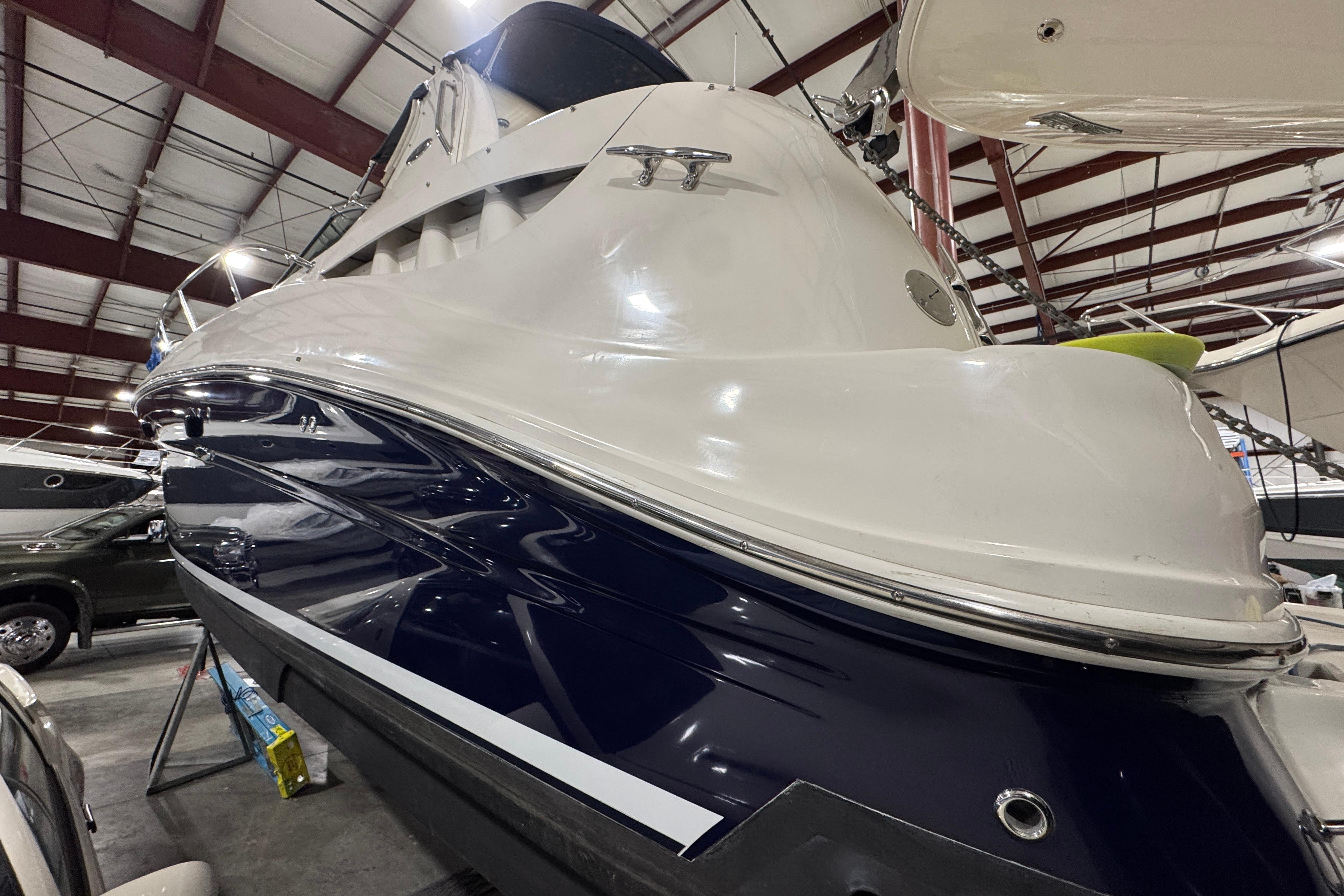 2004 Sea Ray Sundancer 320 yacht in indoor storage facility.