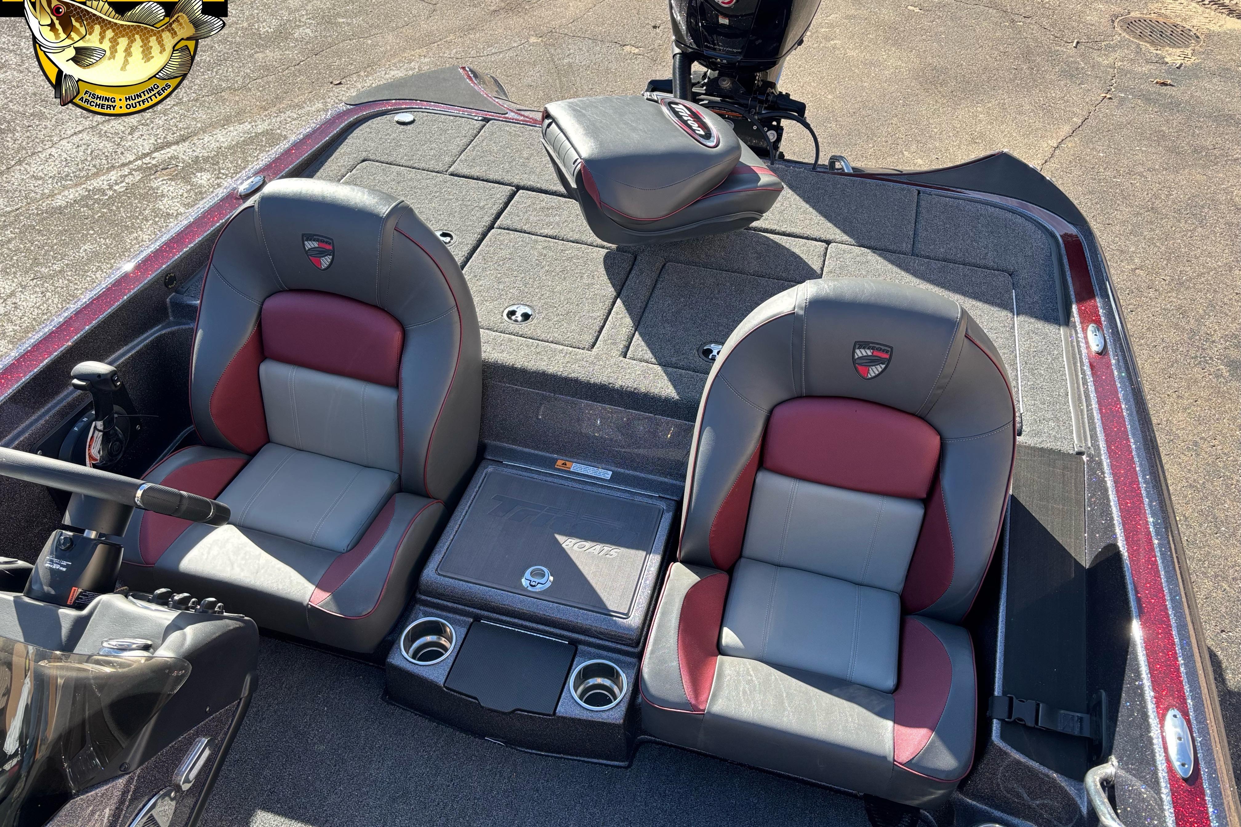 2025 Triton 18 TrX boat interior with dual seats and steering console.