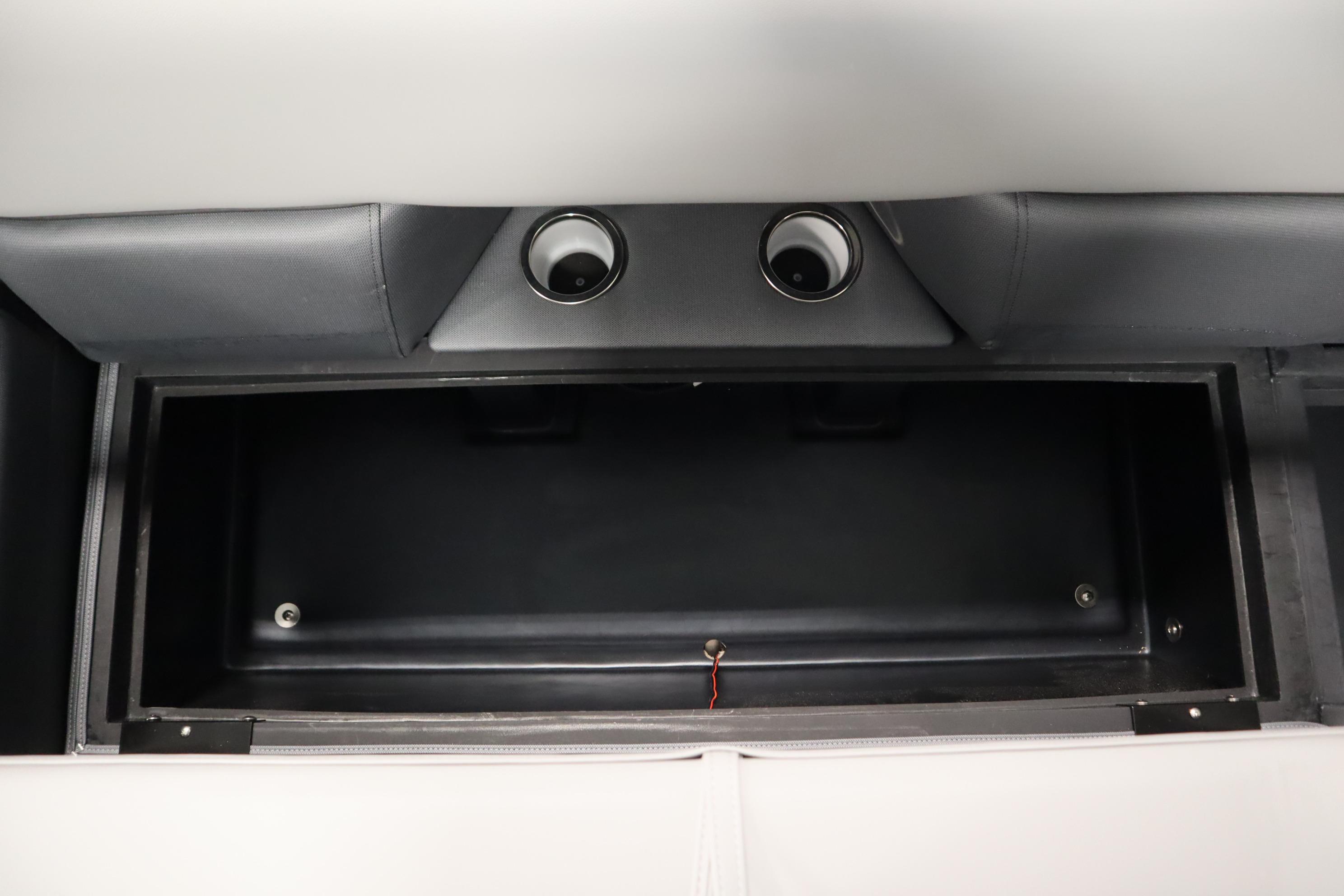 2025 Bentley Pontoons Elite 253 Admiral Tri-toon storage compartment with cup holders.