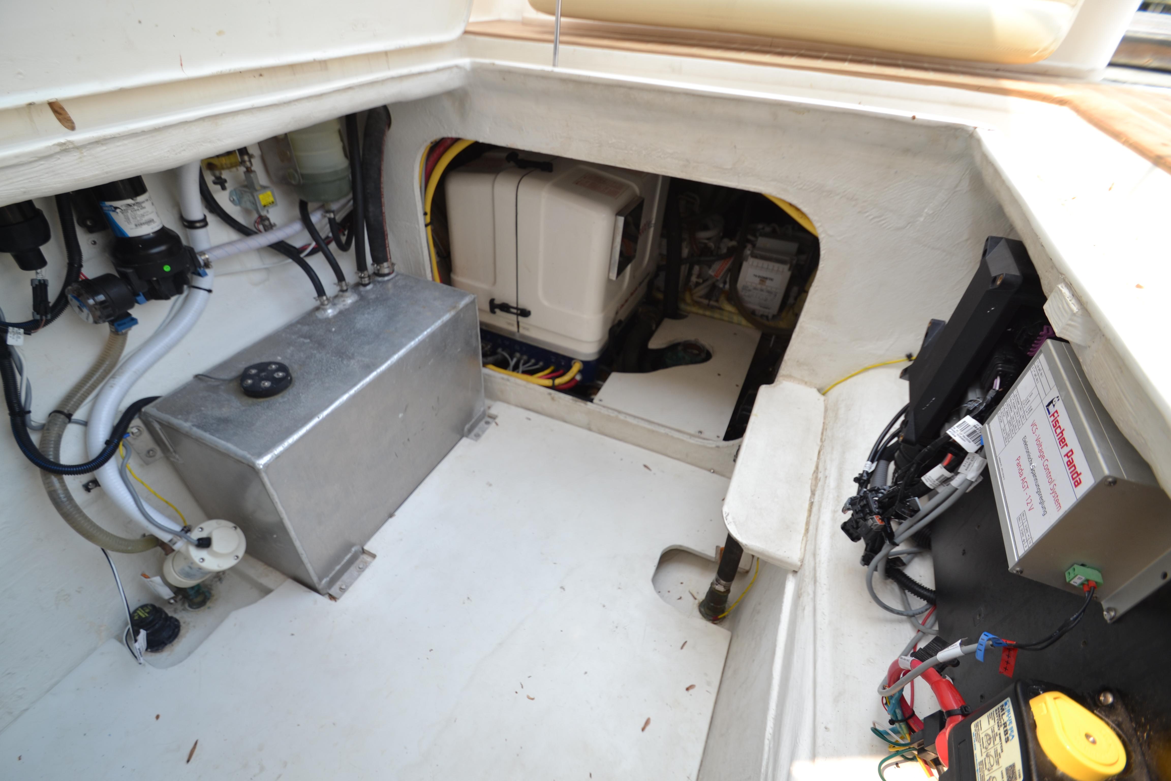 Engine compartment of a 2022 ArrowCat 42 Coupe, showcasing mechanical and electrical components.