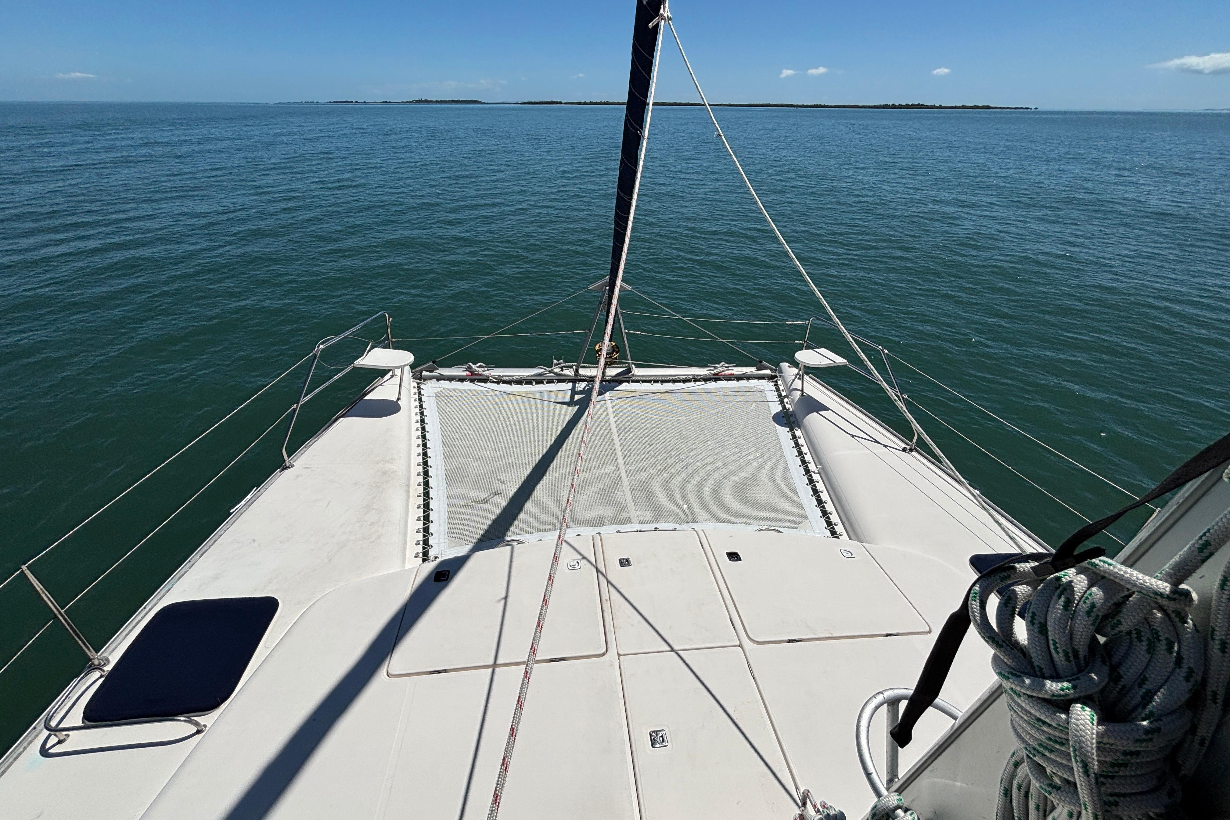 2007 Leopard 40 catamaran deck view on calm ocean waters.