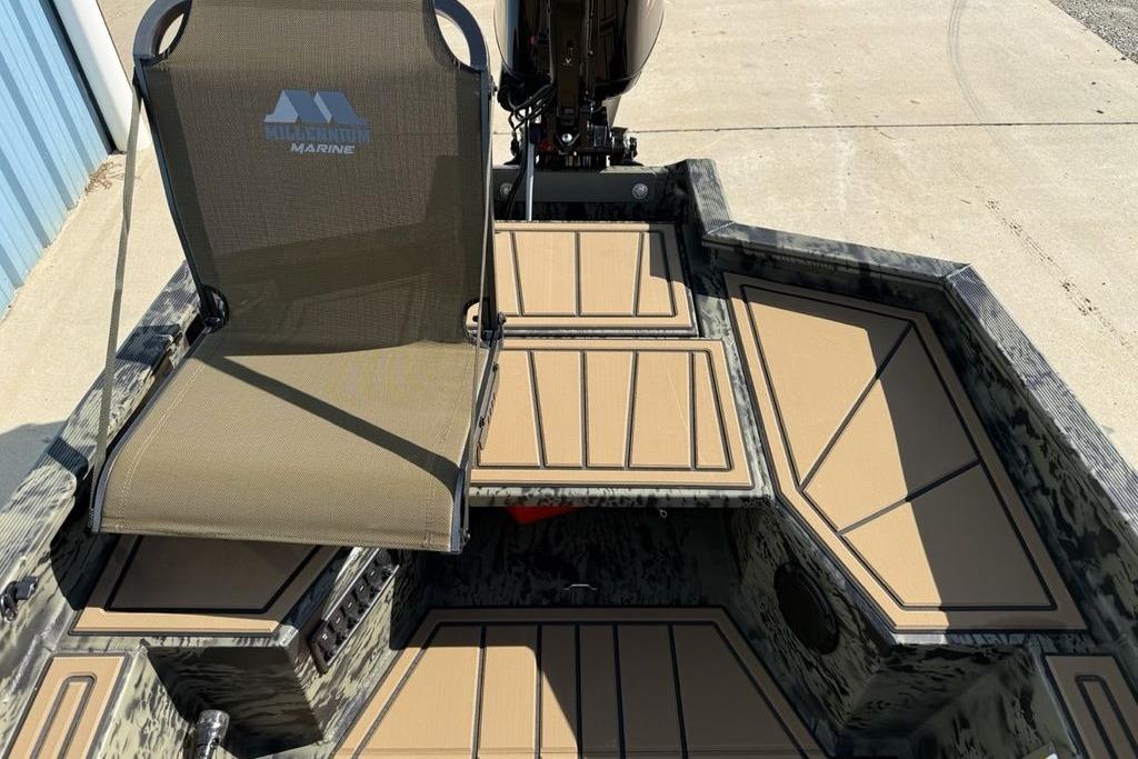 2026 Tracker Grizzly 1650 T Prairie Wings Edition boat interior with seating and deck.