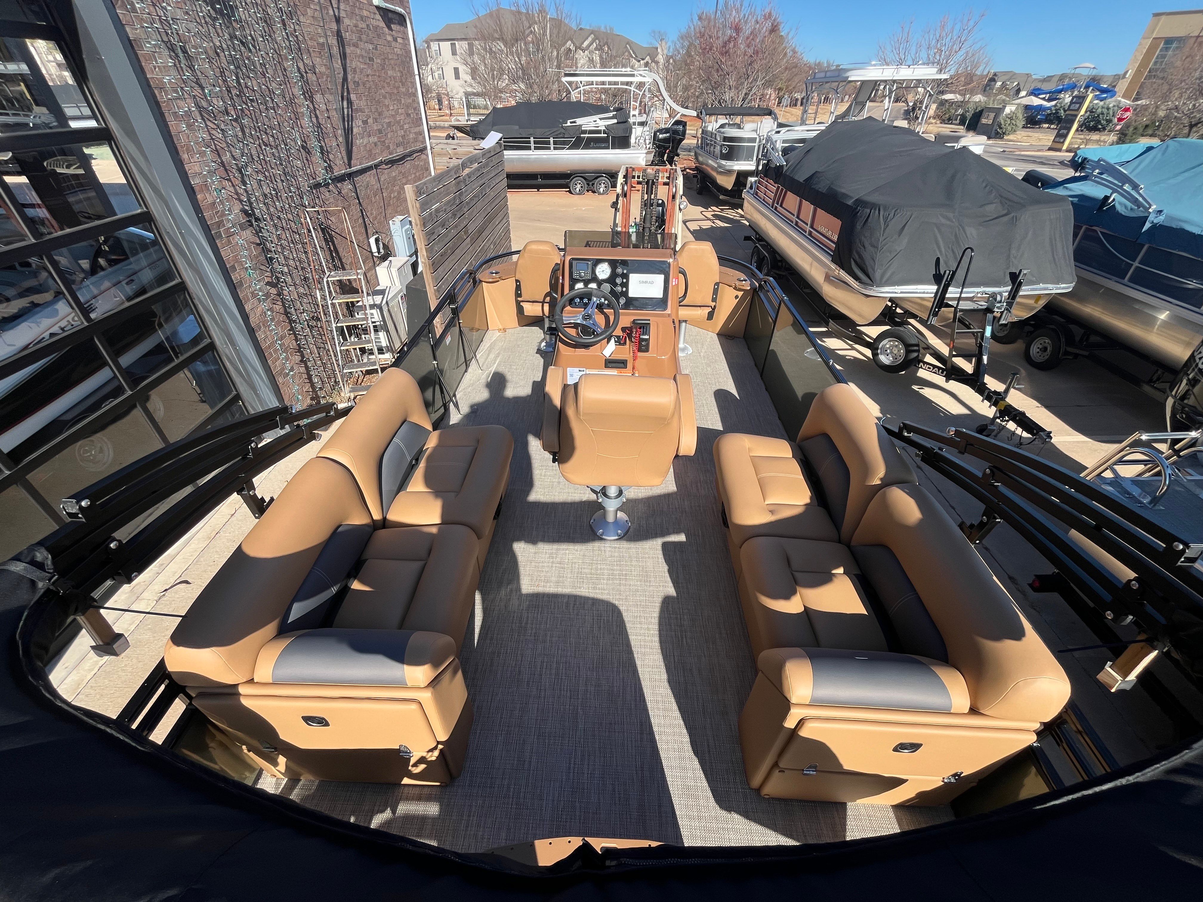 Interior of 2026 Landau Alure 21CC Fish with beige seating.