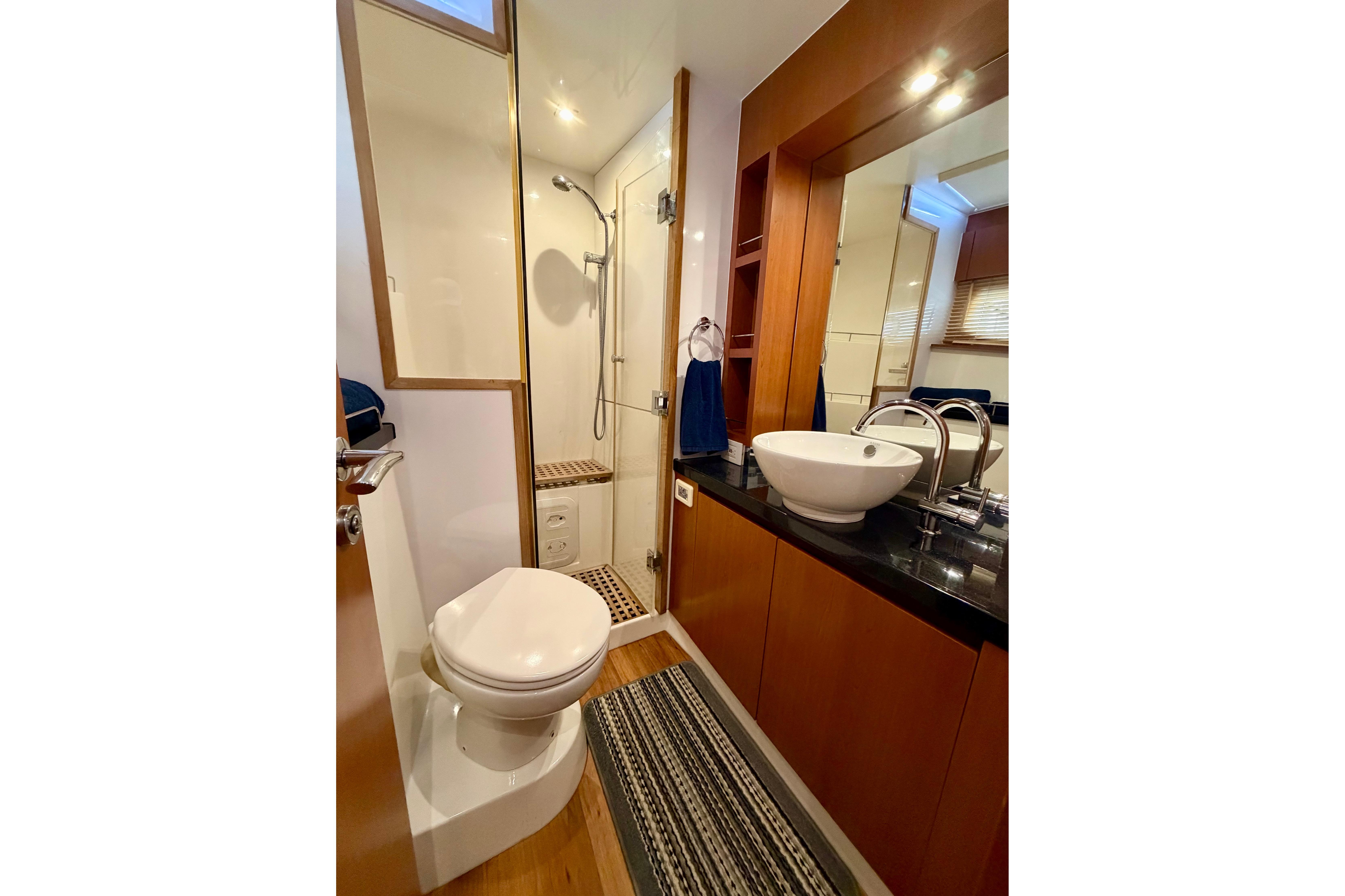 Luxurious bathroom in 2017 Aquila 44 Yacht with modern fixtures and elegant design.