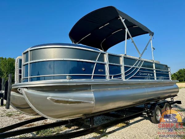 2025 South Bay 224FCR LE pontoon boat with canopy on trailer.