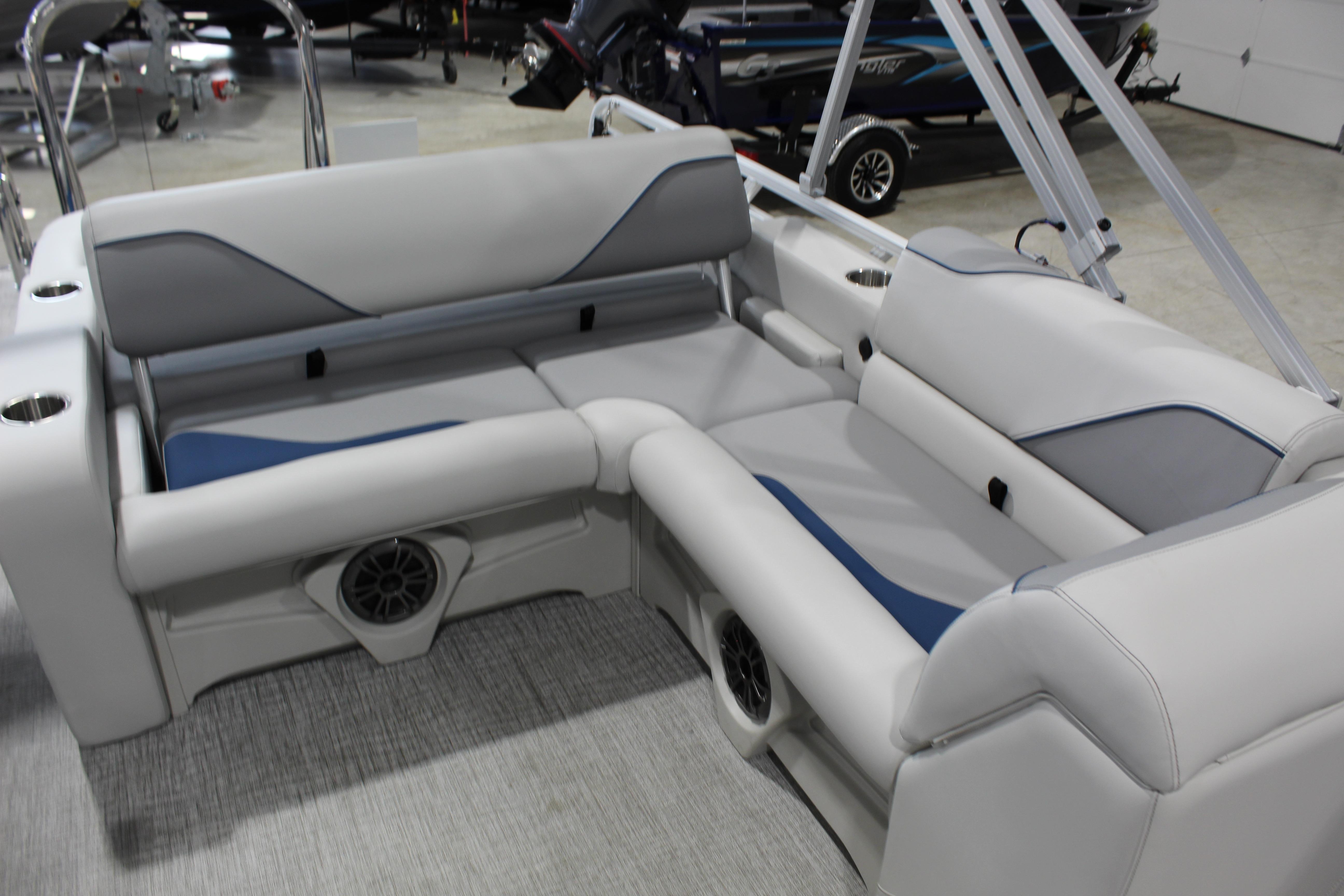 2026 Avalon 2385 25 Venture 85 VRB boat interior with gray seating and speaker system.