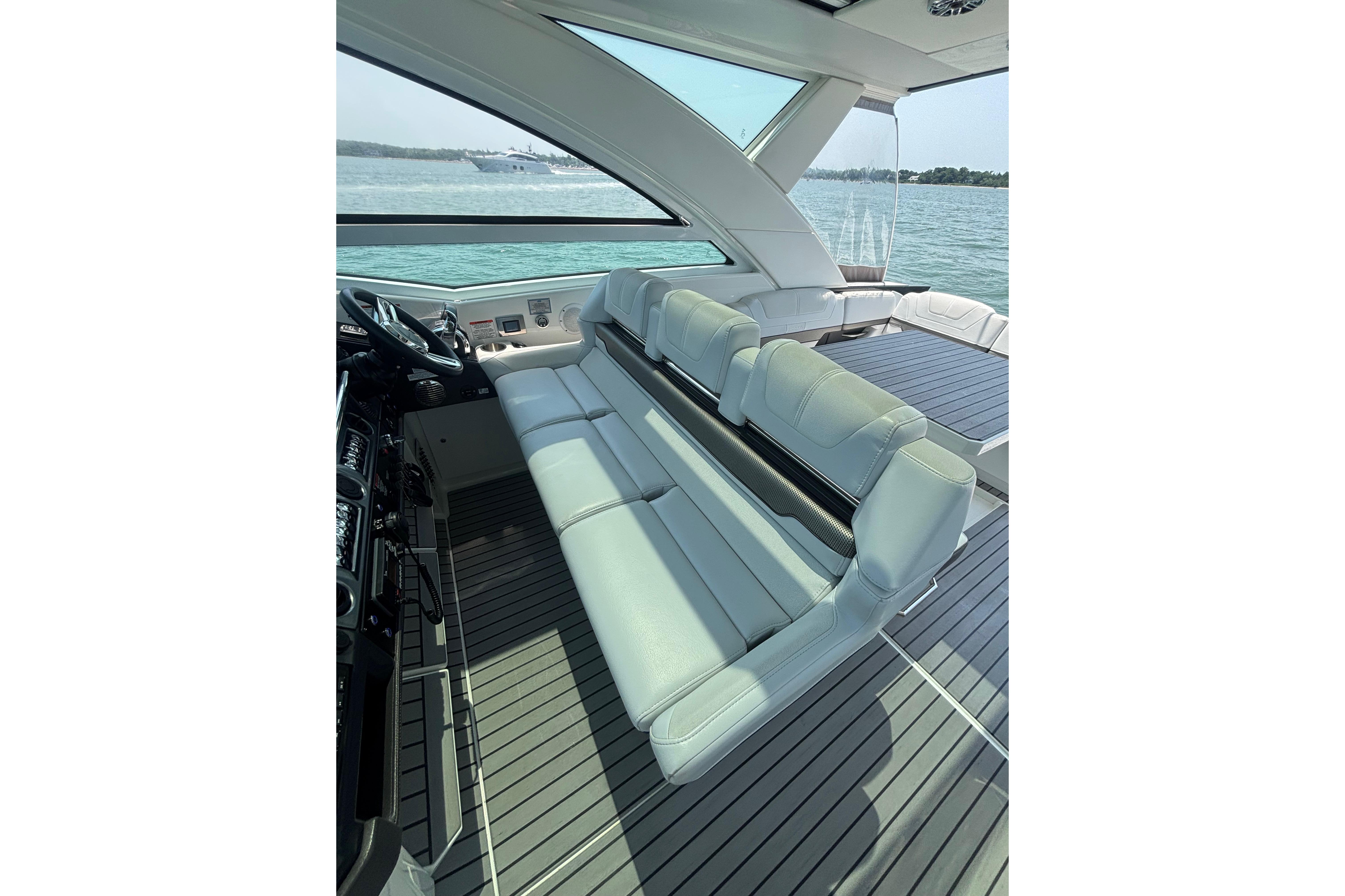 Luxurious interior of 2019 Formula 430 Super Sport Crossover yacht with sleek seating and ocean view.