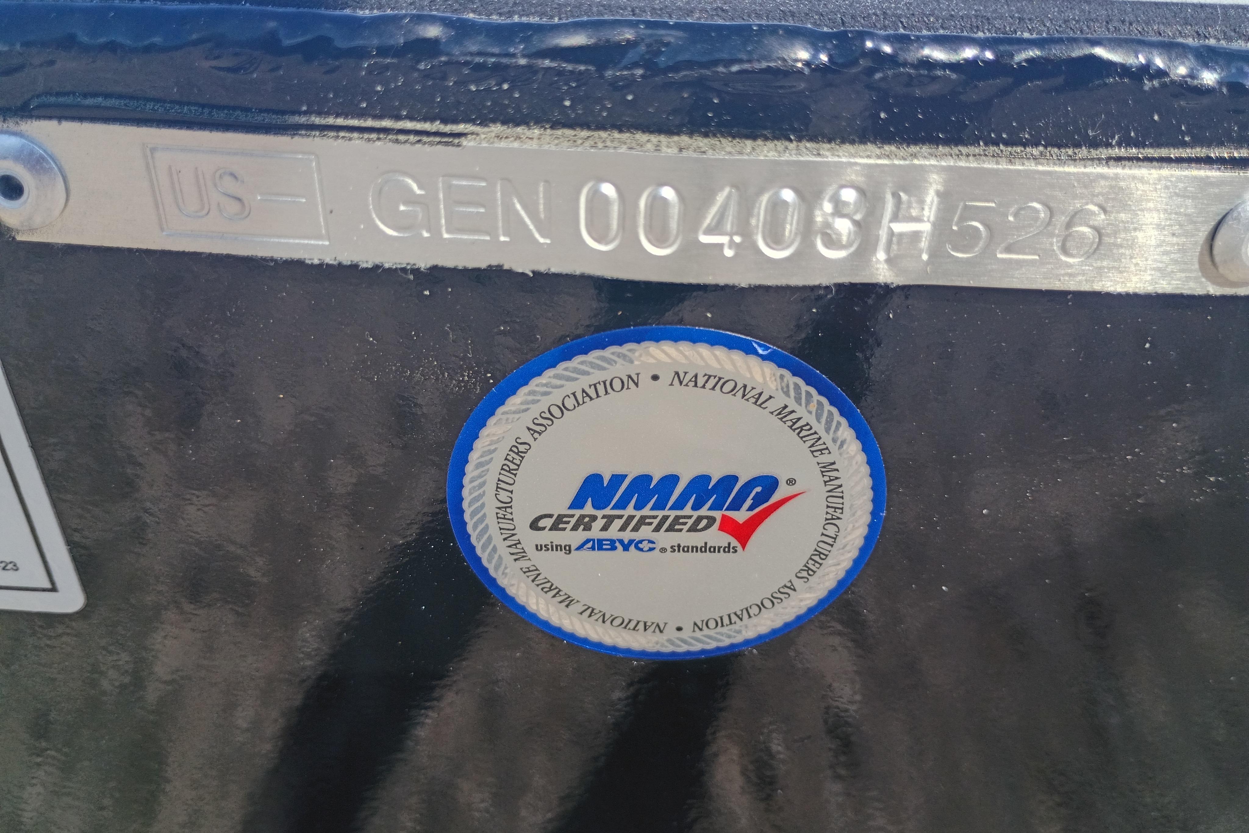 Boat hull identification number and NMMA certification sticker on a 2026 G3 1810SE model.