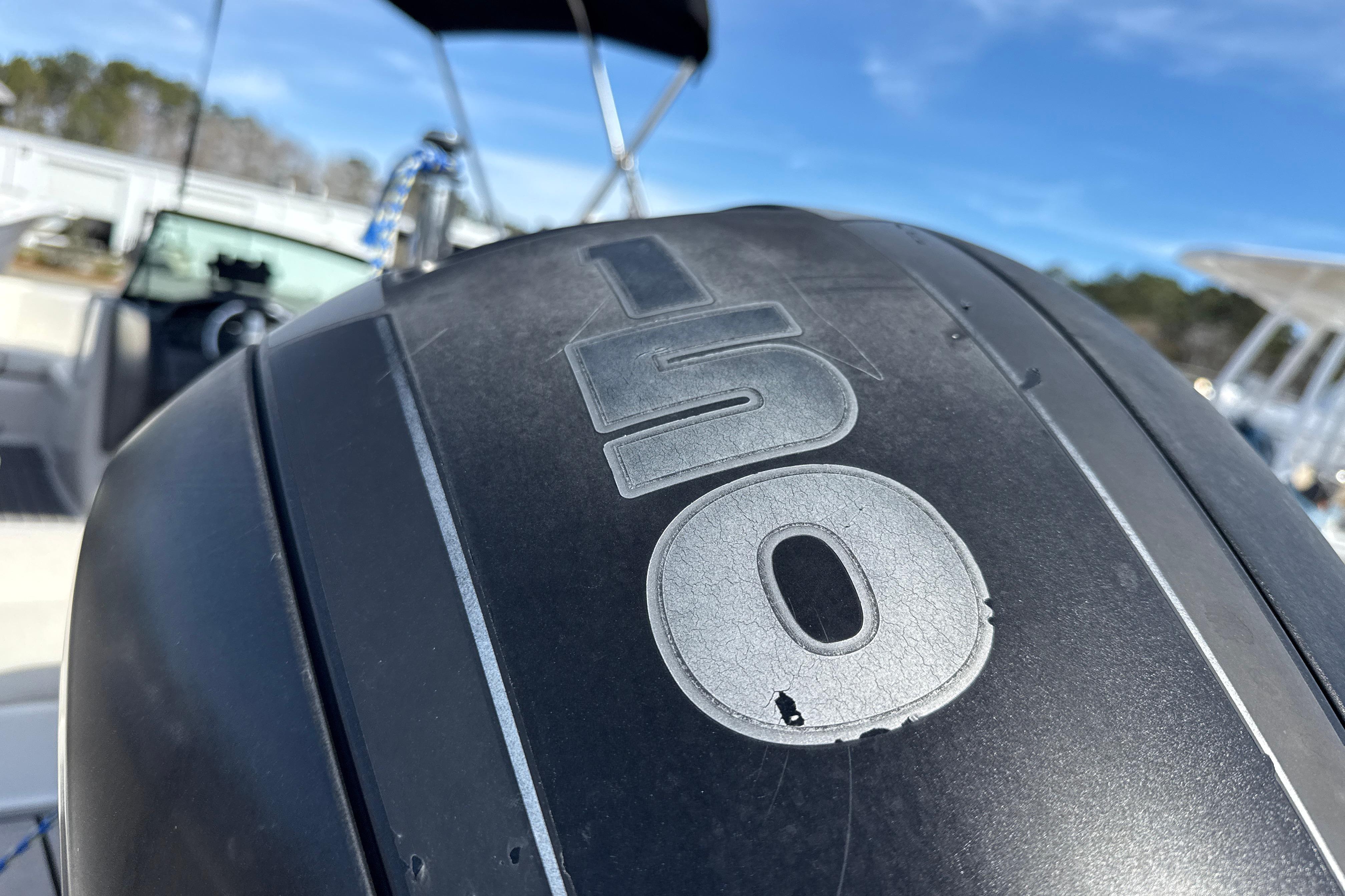 2014 Monterey 197 Blackfin boat engine close-up with "150" marking.