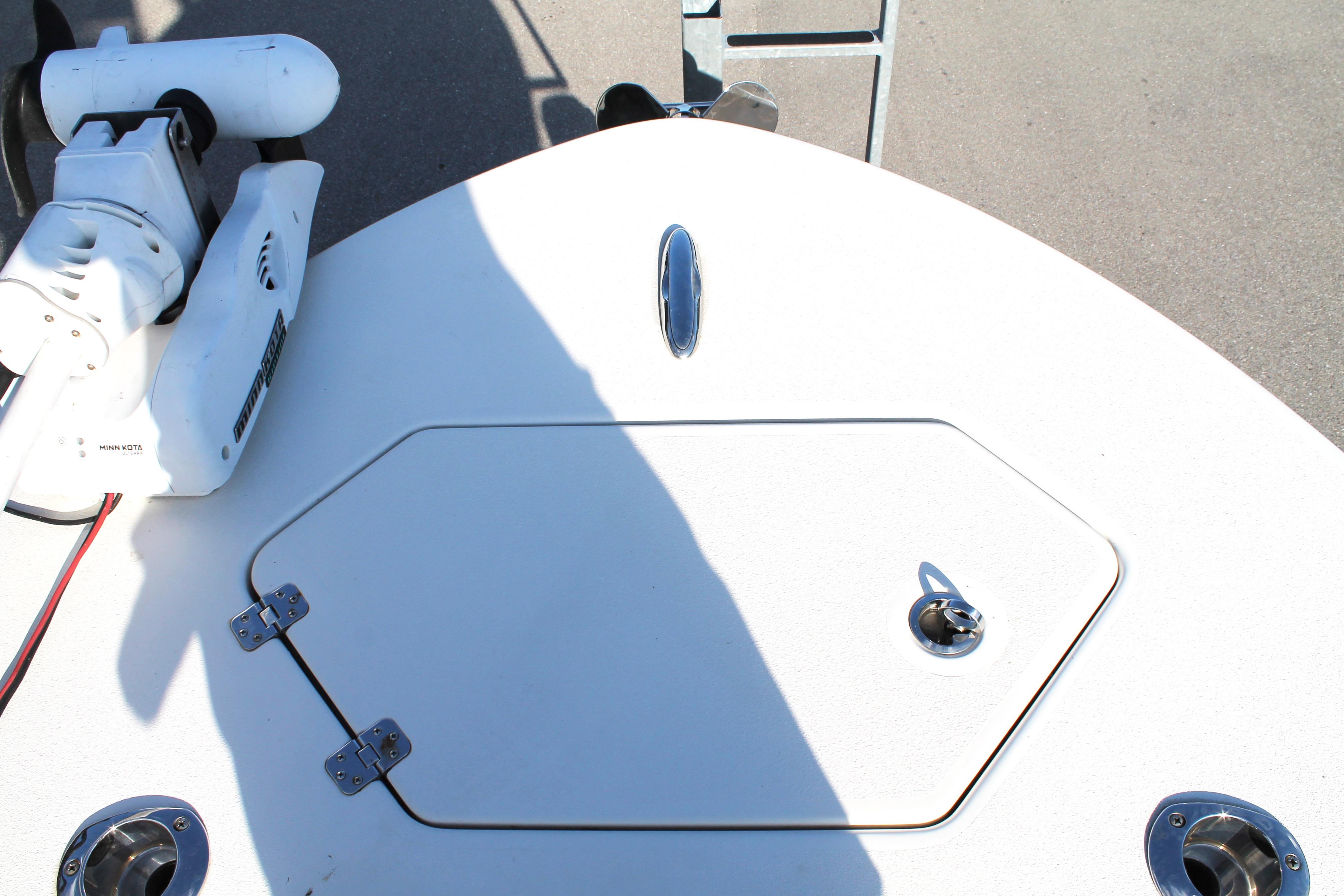 2018 Andros 26 Tarpon boat deck with hatch and trolling motor.