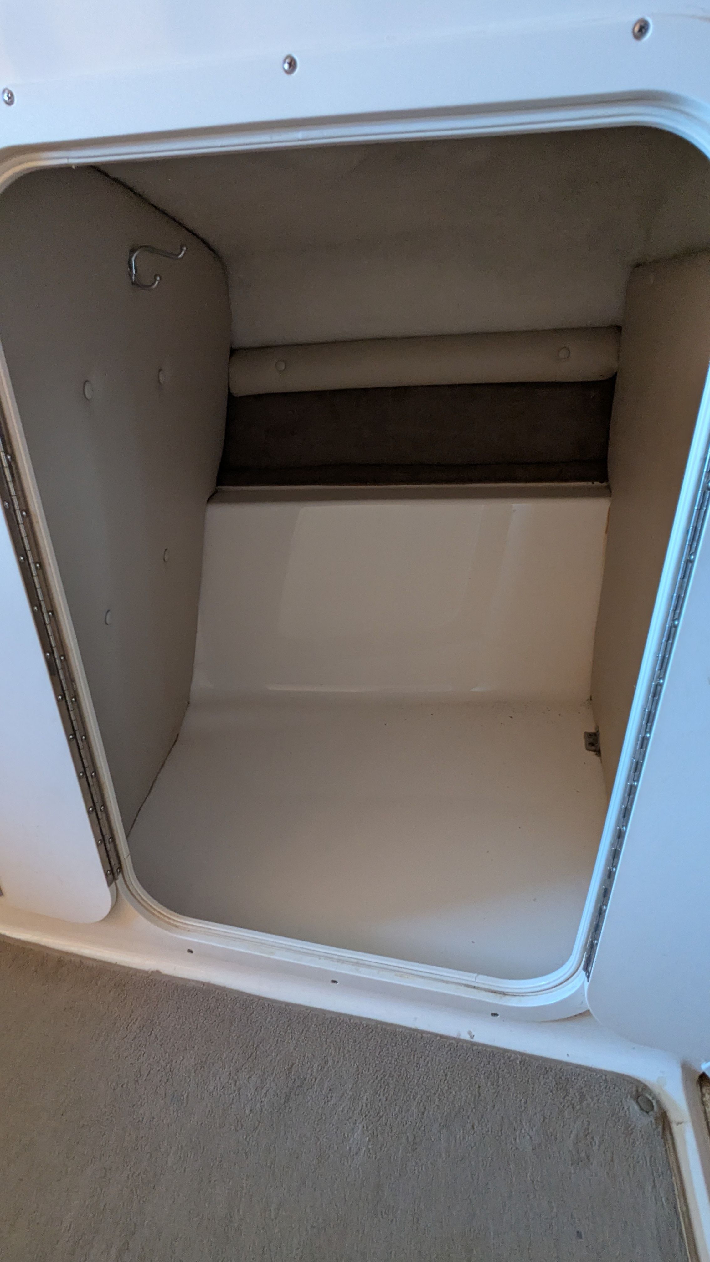 Interior of a 2000 Chaparral 240 SSi boat with padded walls.