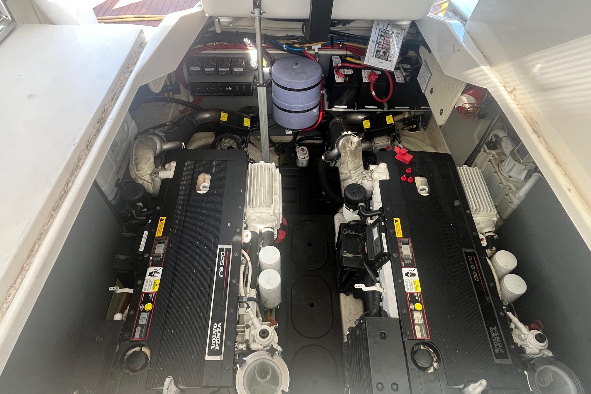 Engine room of 2010 Monterey 400 Sport Yacht with dual Volvo Penta engines.