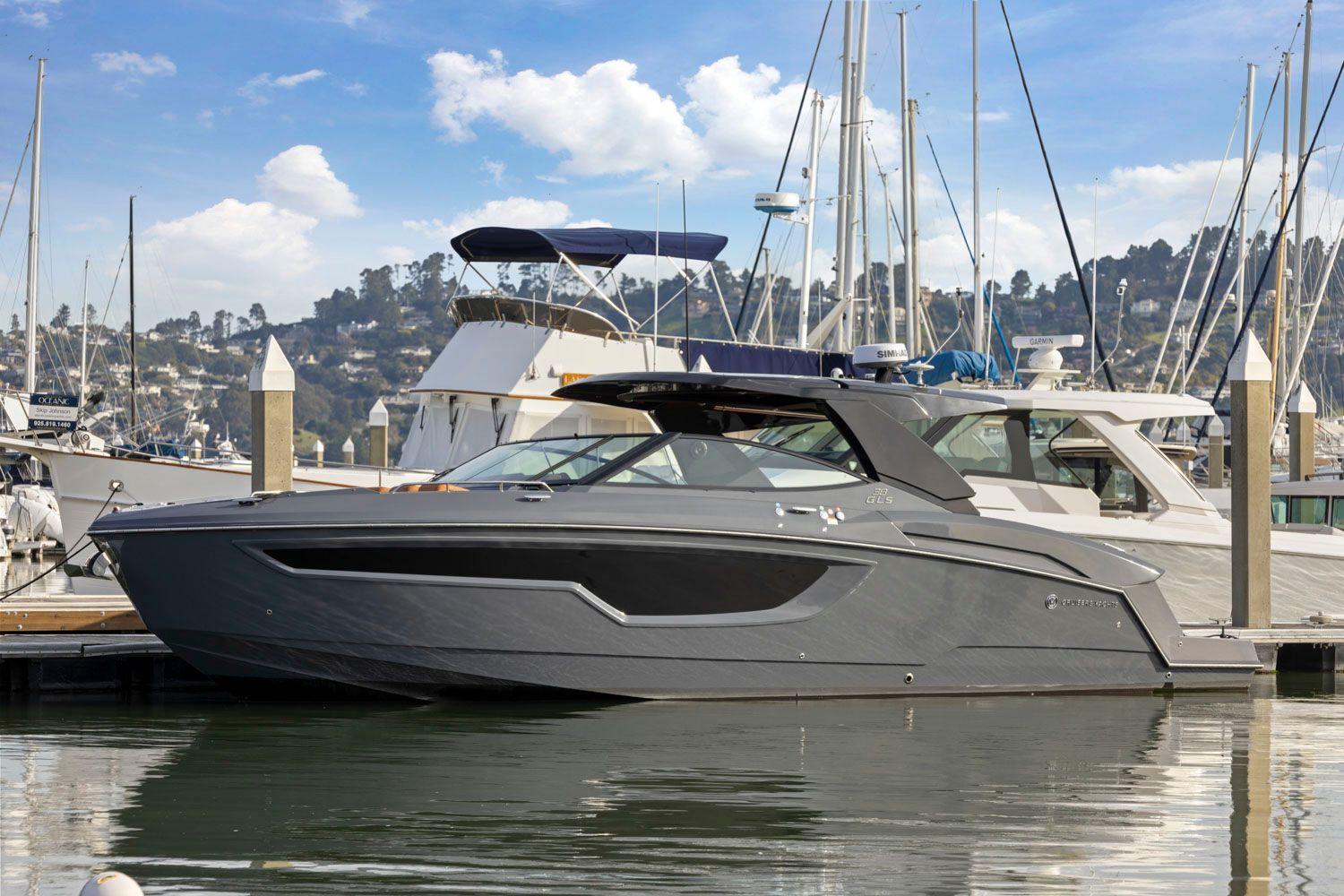 2022 Cruisers Yachts 38 GLS South Beach IO docked in a marina.