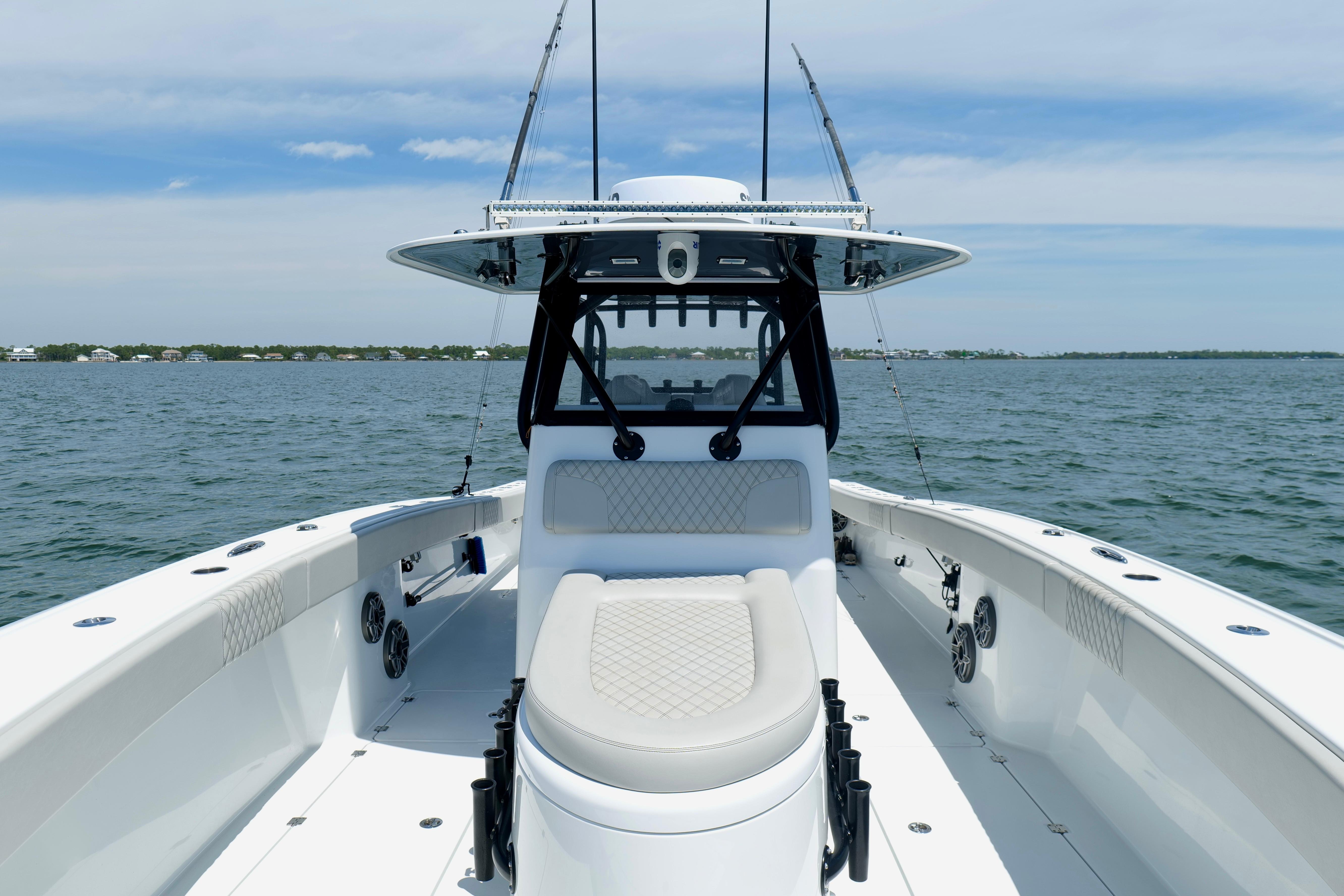 2023 Freeman 34VH boat on open water, showcasing sleek design and spacious deck.