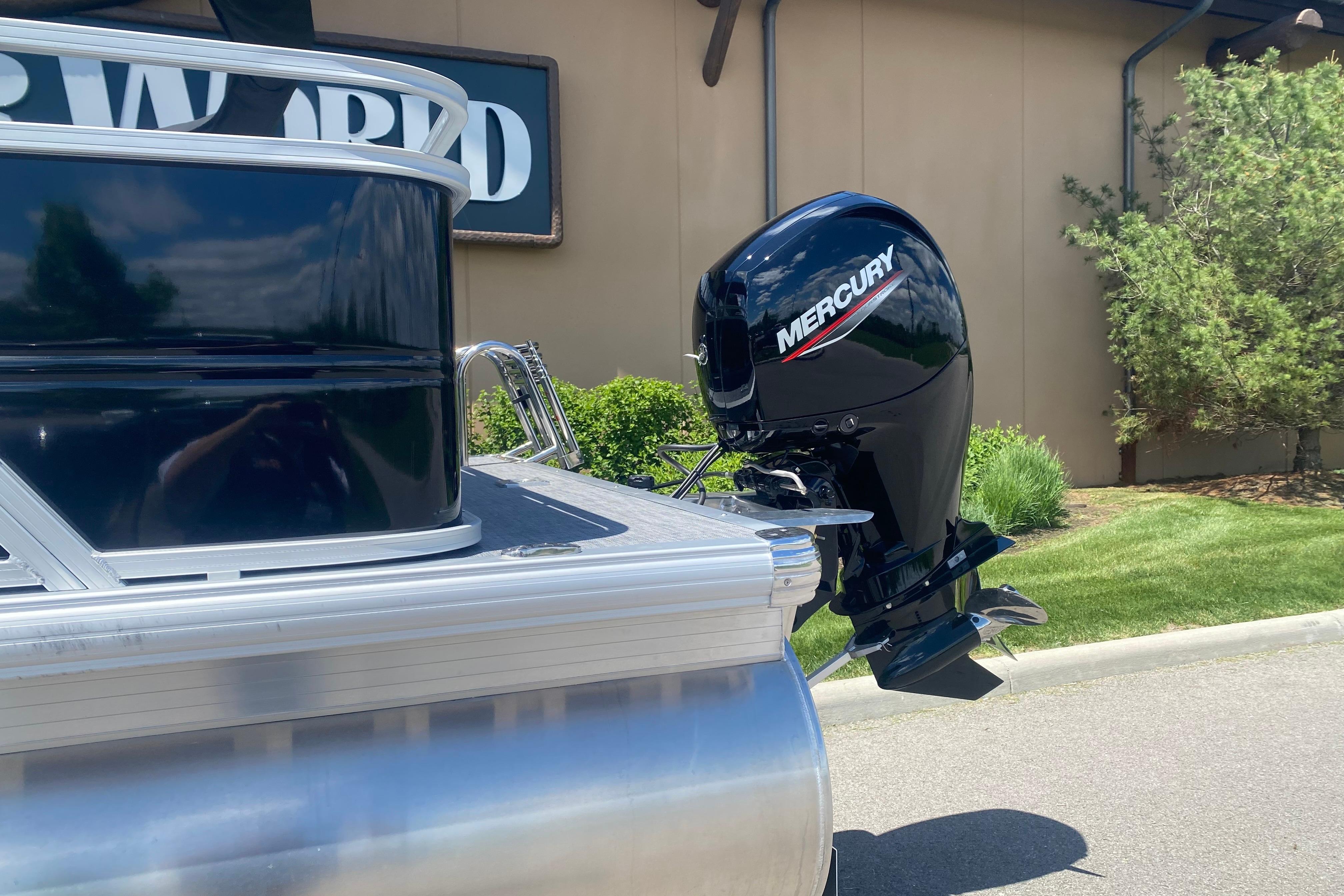 2026 Sun Tracker Party Barge 22 RF DLX with Mercury outboard motor.