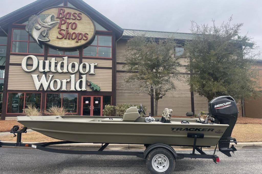 2026 Tracker Grizzly 1754 SC boat outside Bass Pro Shops Outdoor World.
