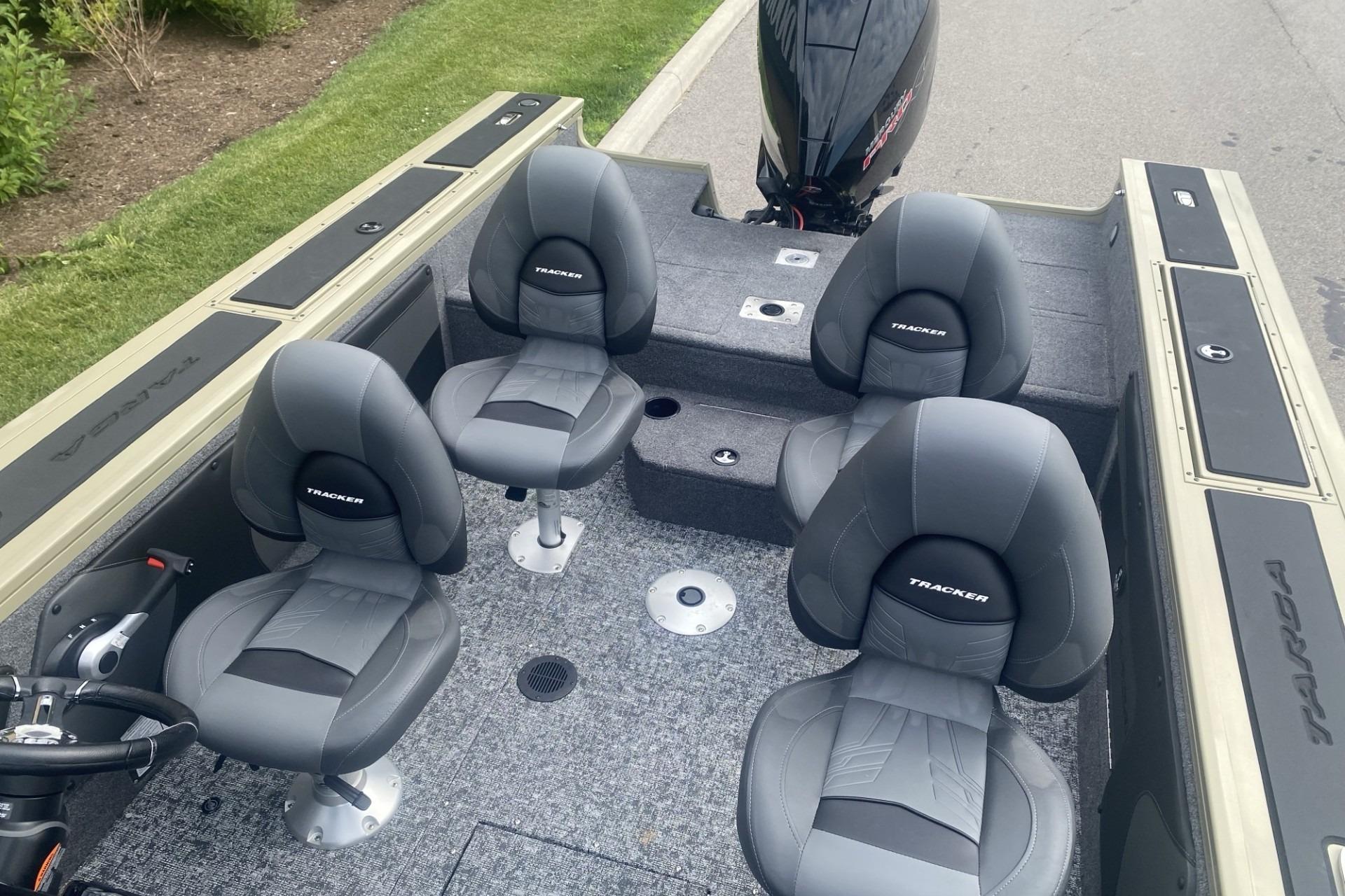 2026 Tracker Targa V-19 WT boat interior with four gray seats and a sleek design.