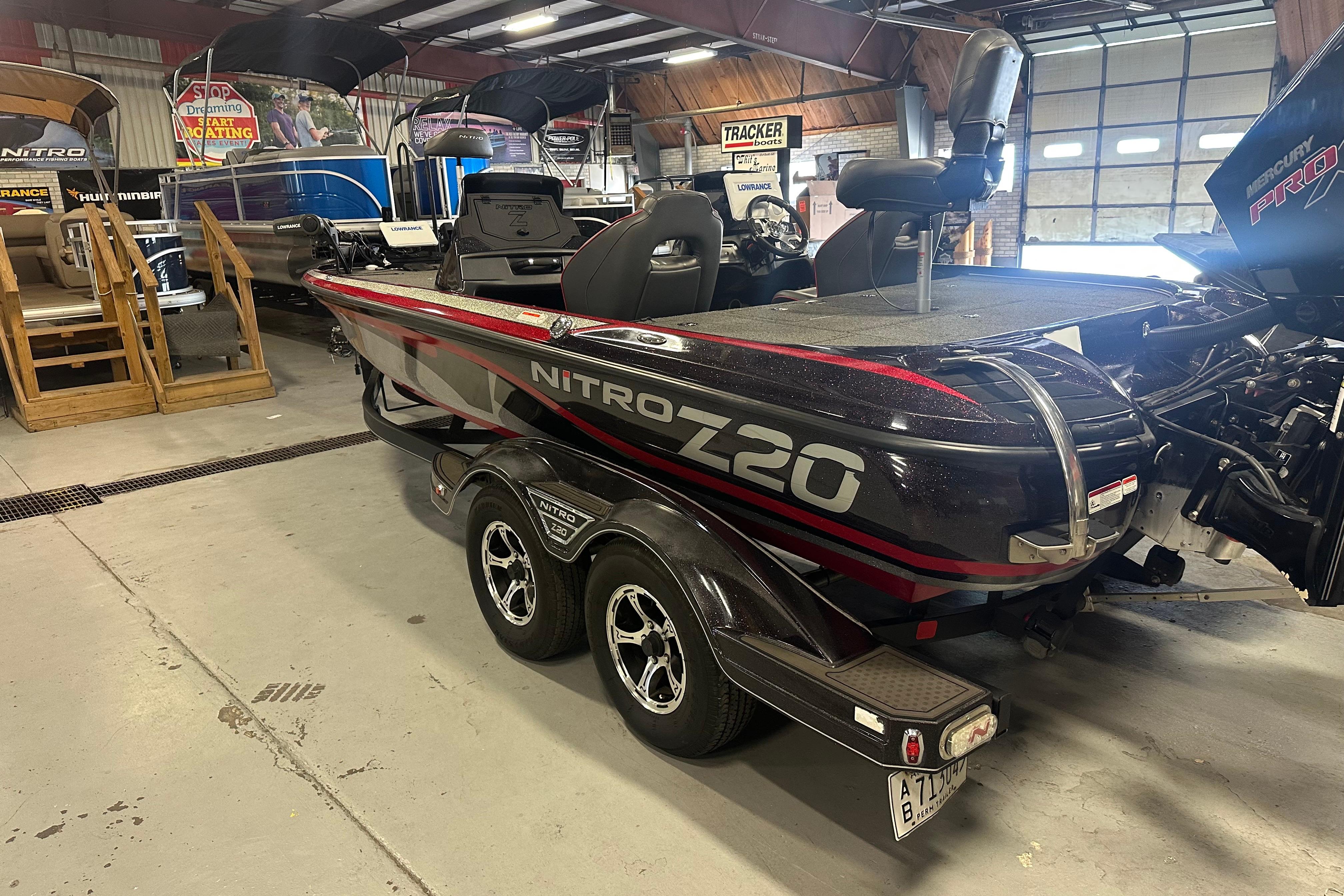 2022 Nitro Z20 Pro boat in showroom, featuring sleek design and dual seats.