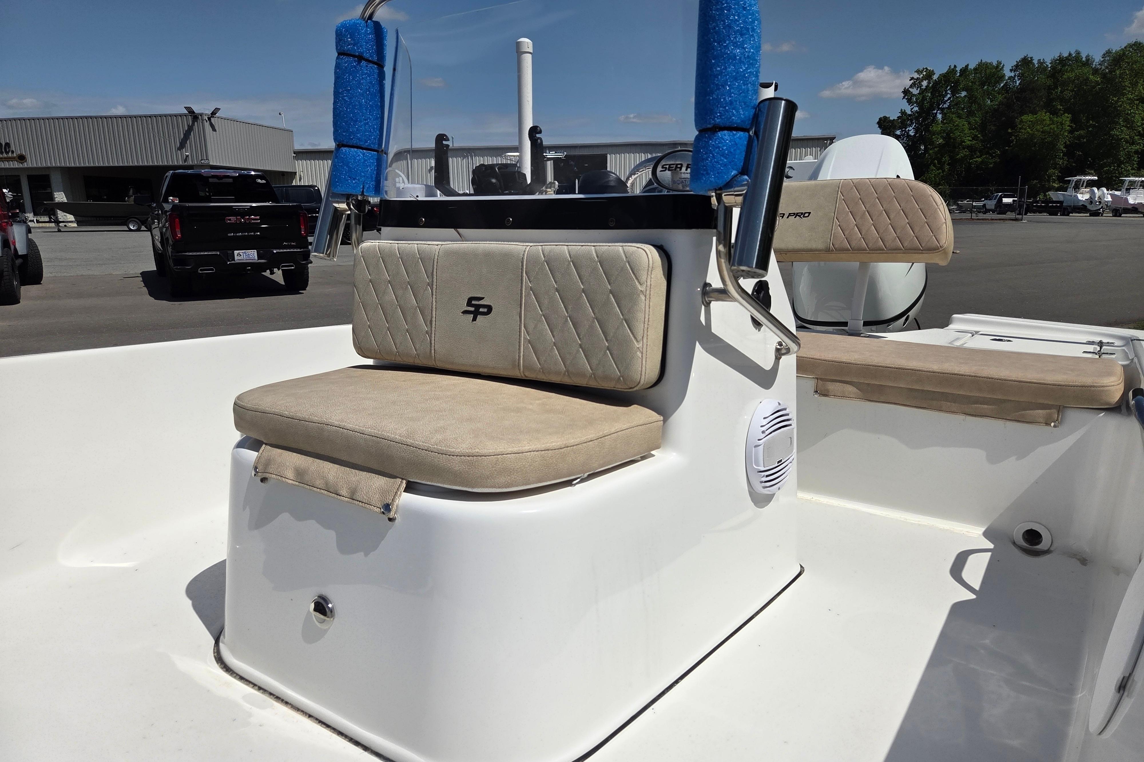 2024 Sea Pro 172 Bay boat interior with cushioned seating and console.