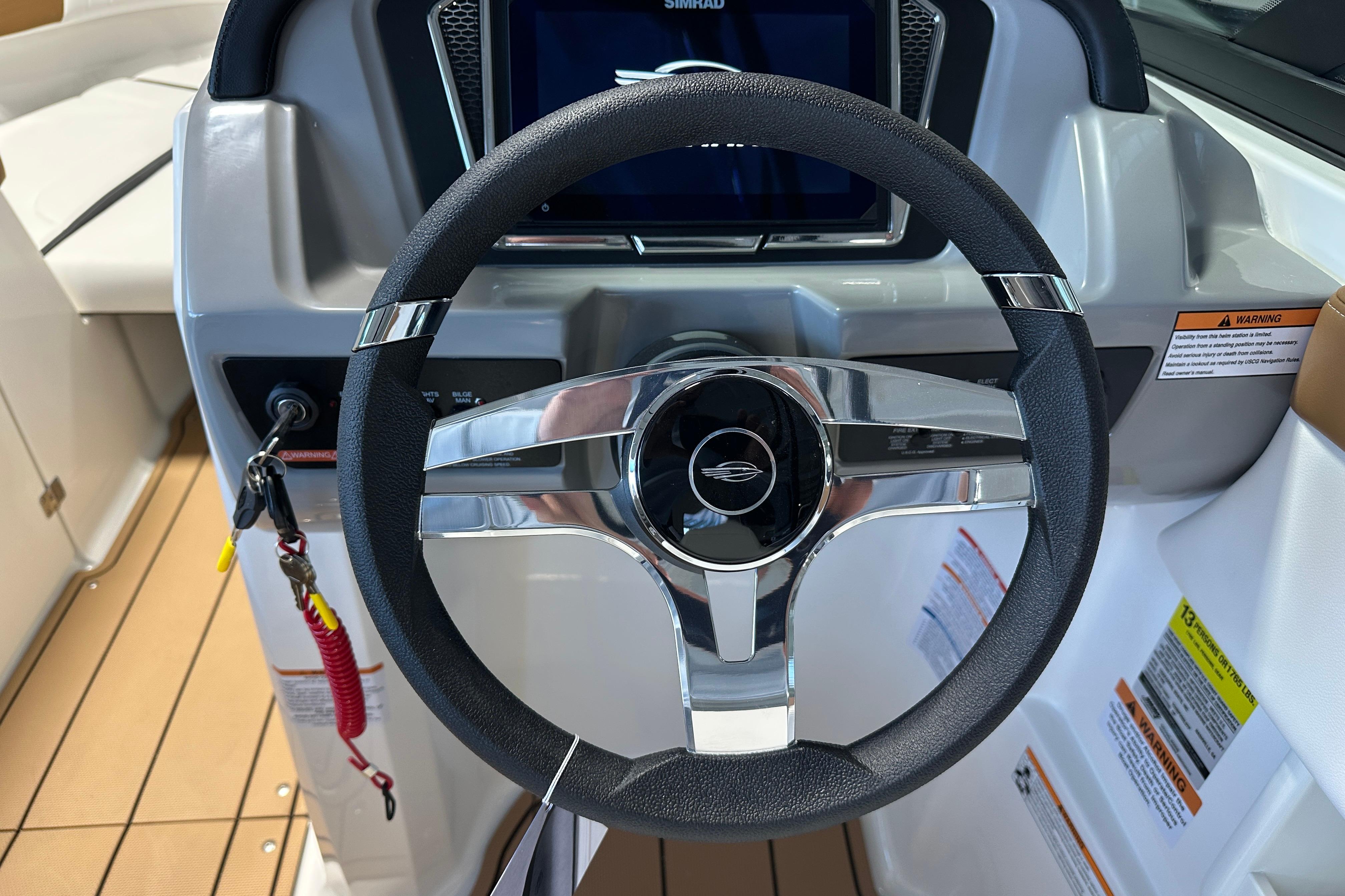 2026 Chaparral 23 SSi steering wheel with modern display.