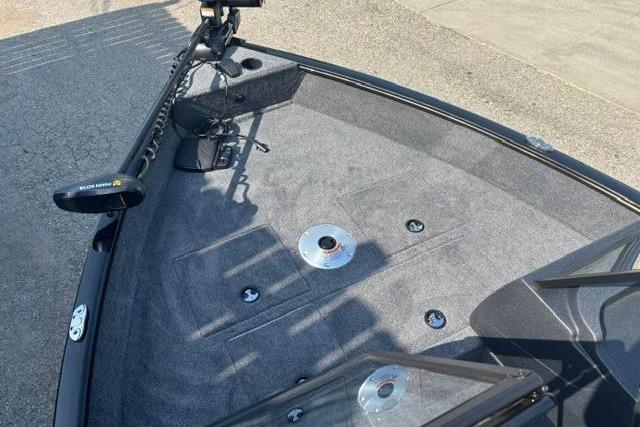 2026 Tracker Pro Guide V-16 WT boat deck with trolling motor and carpeted surface.
