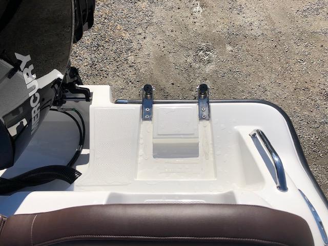 2024 Reflex Gladiator boat with Mercury engine, rear view.
