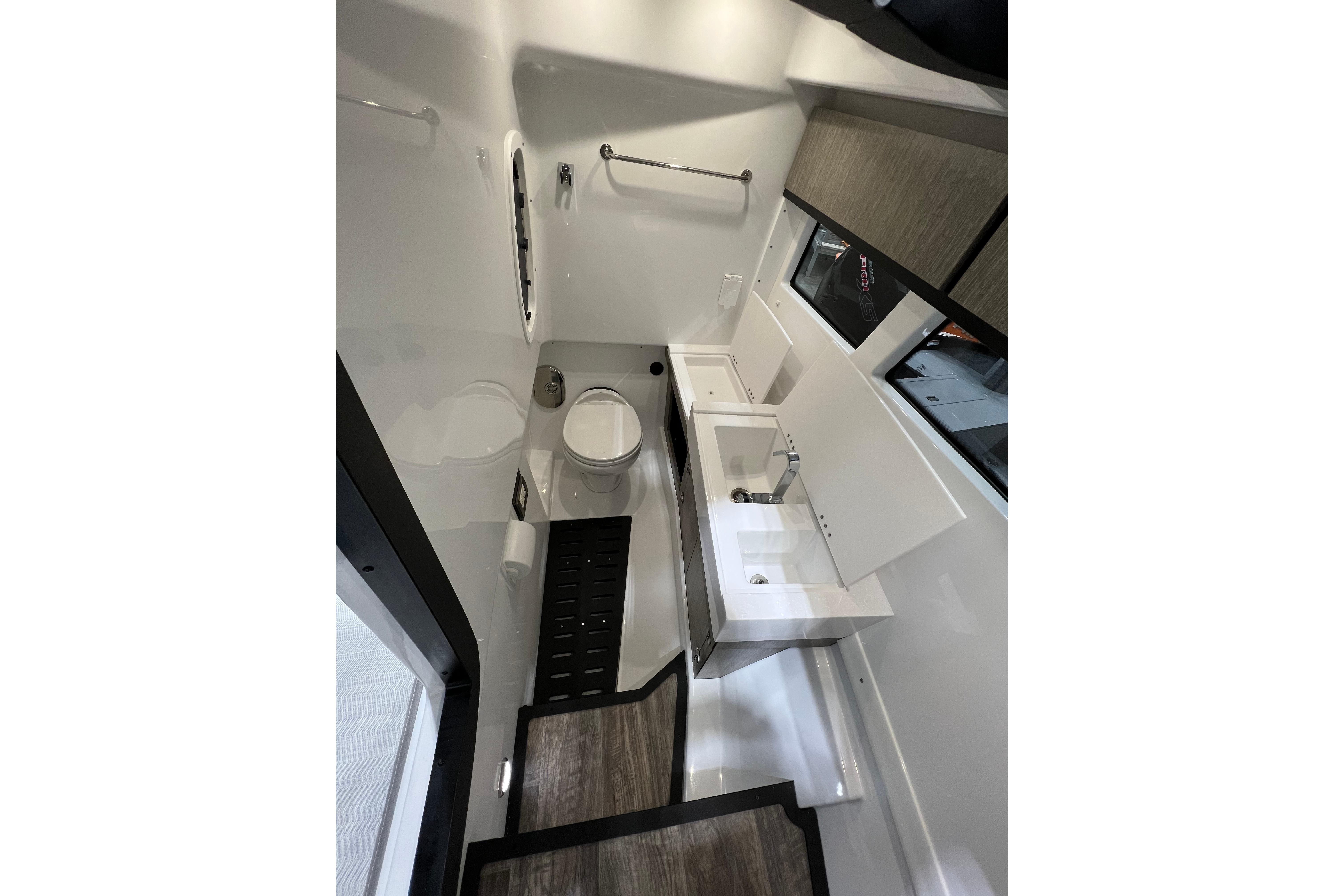 Interior of 2023 Monterey 378SS Super Sport boat bathroom with modern fixtures and sleek design.