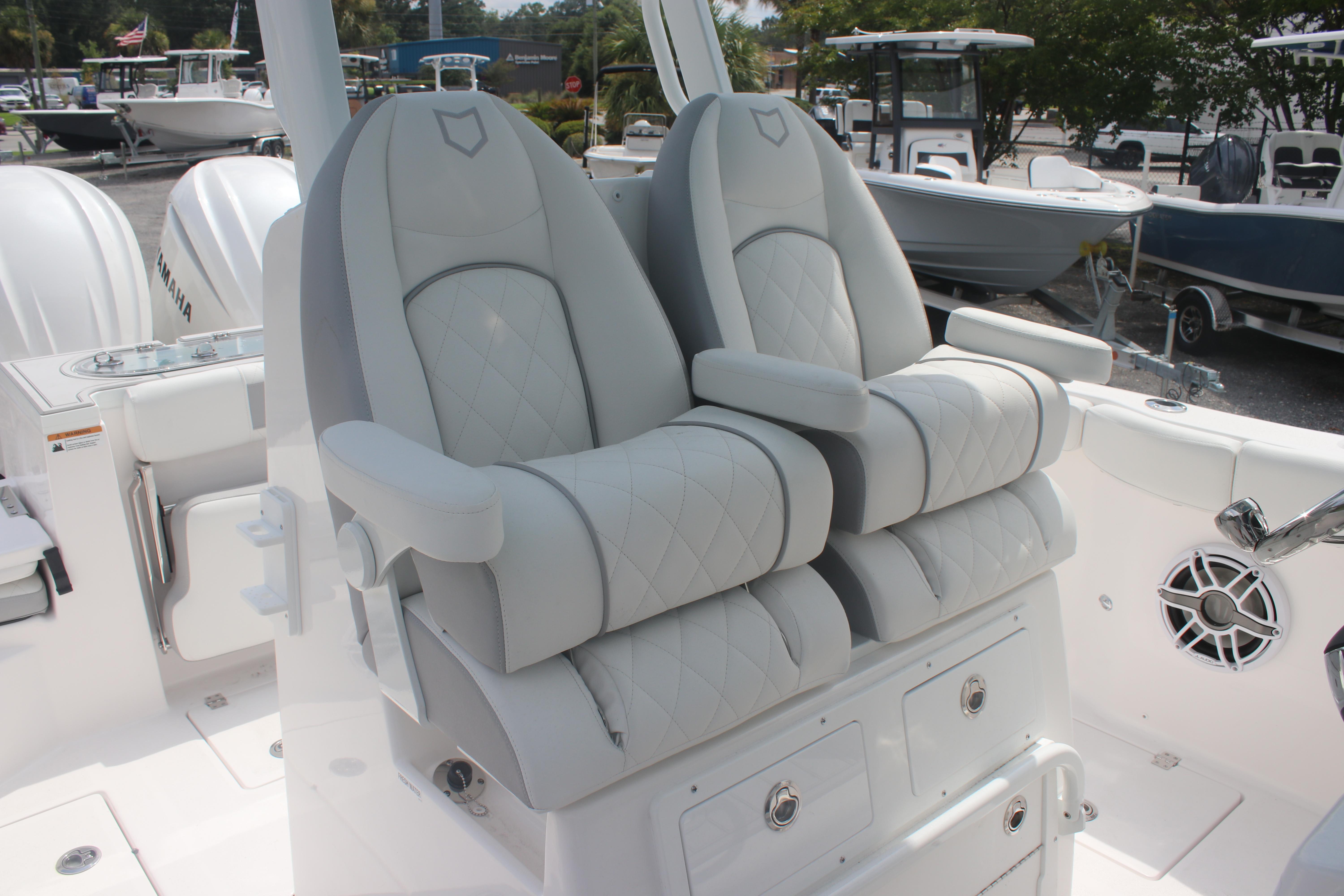 Luxury seating on 2026 Sea Fox 288 Commander boat, featuring plush, diamond-stitched upholstery.