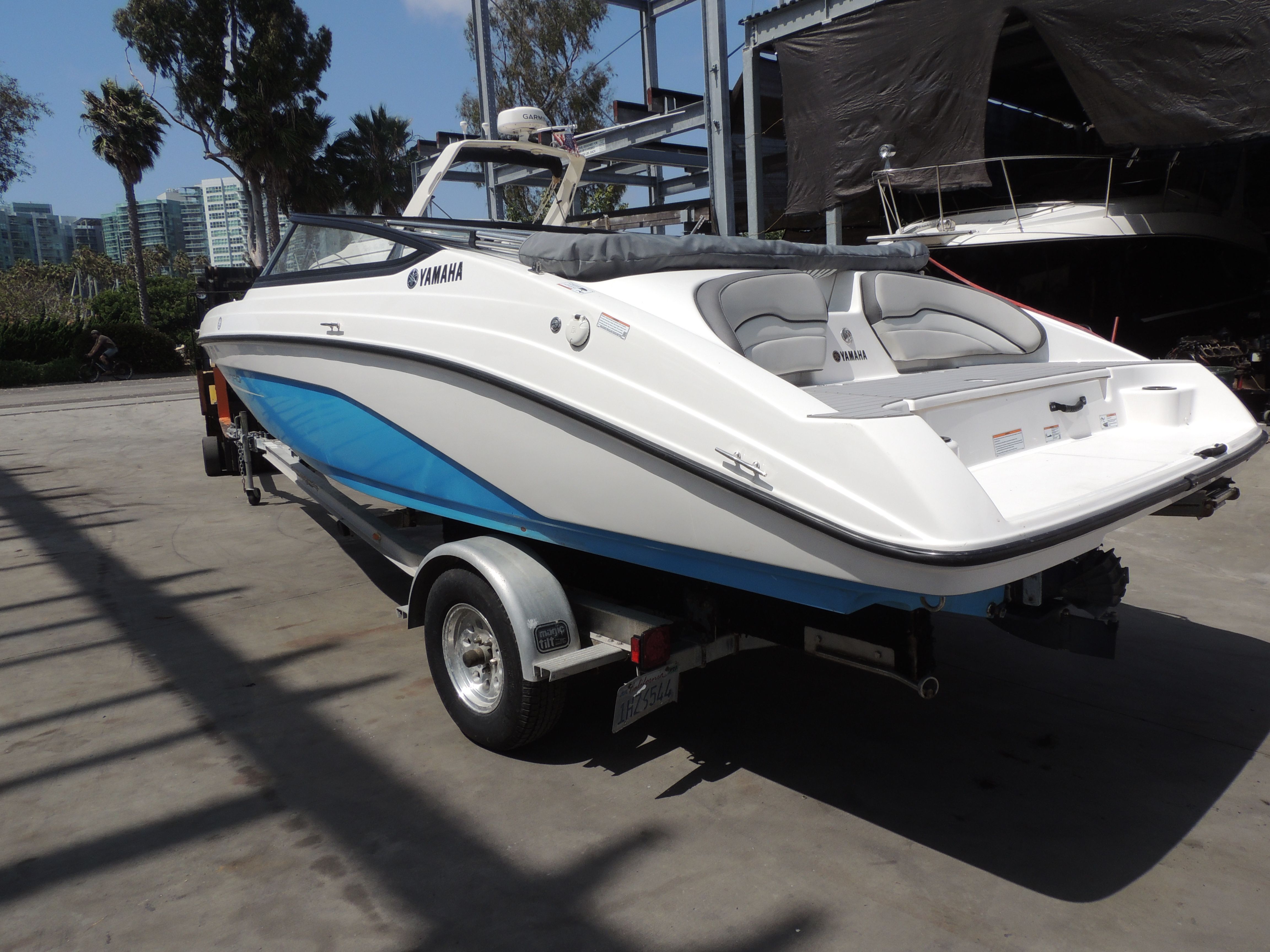 2023 Yamaha SX190 boat on a trailer outdoors.