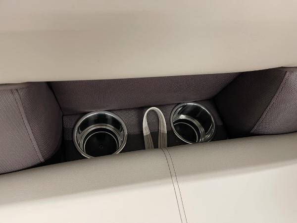 2025 Bentley Pontoons 200 Fish-N-Cruise cup holders in beige and gray seating.