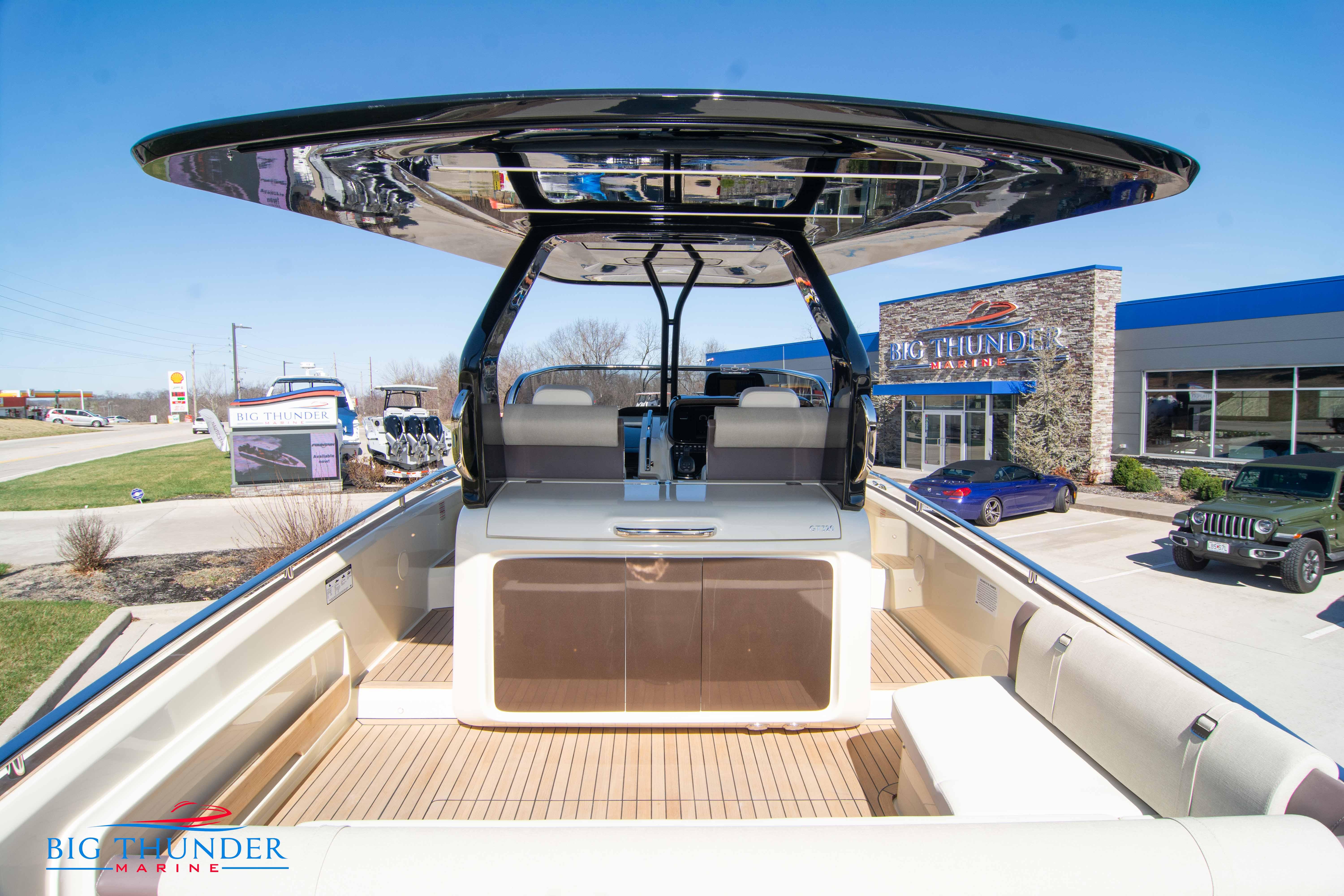 2024 Invictus GT320 luxury boat at Big Thunder Marine dealership.