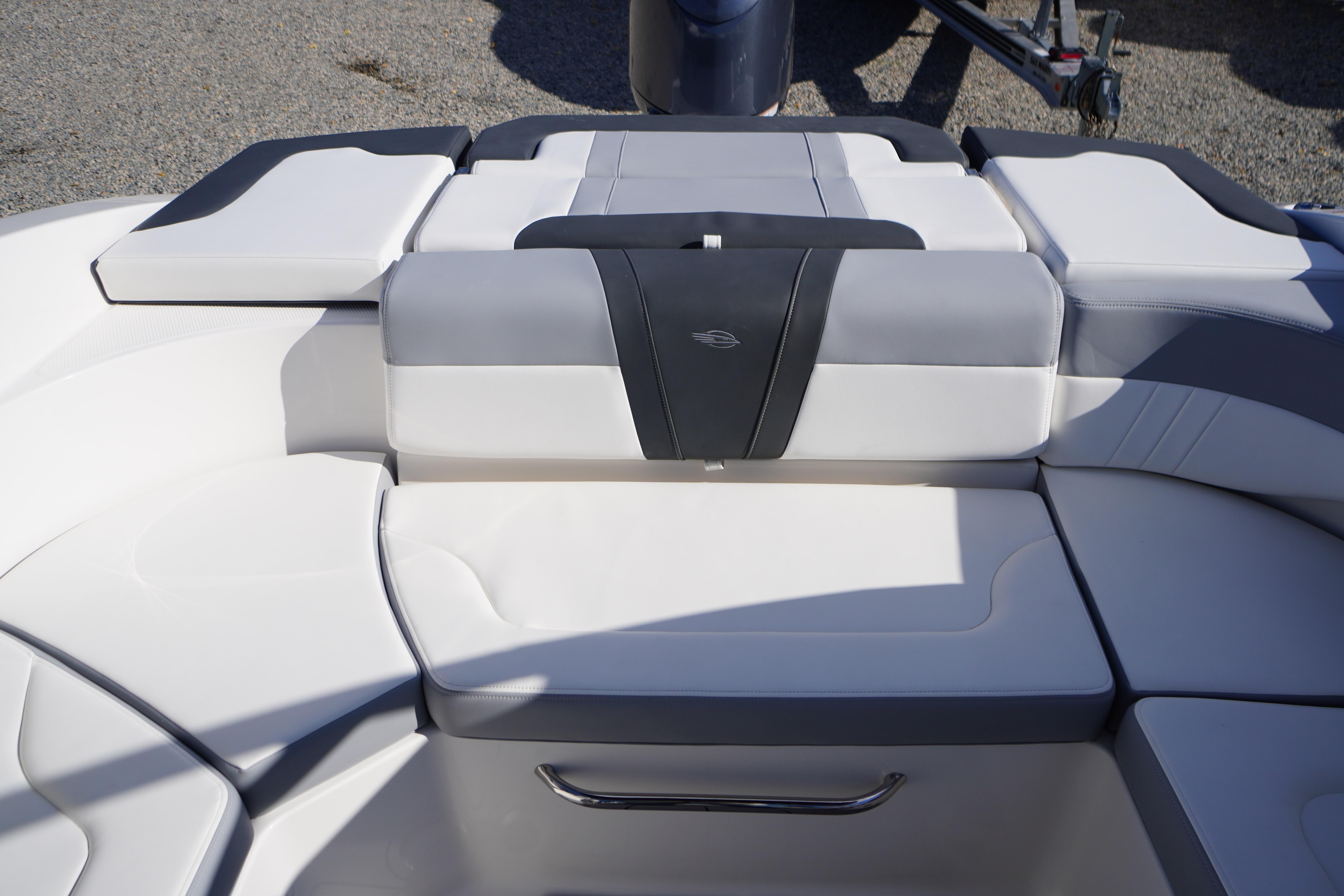 2026 Chaparral 23 SSi OB boat interior with cushioned seating and sleek design.