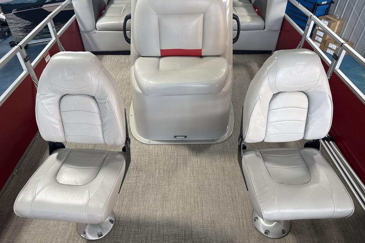 2022 Landau ALURE 232 boat interior with white seating and red accents.