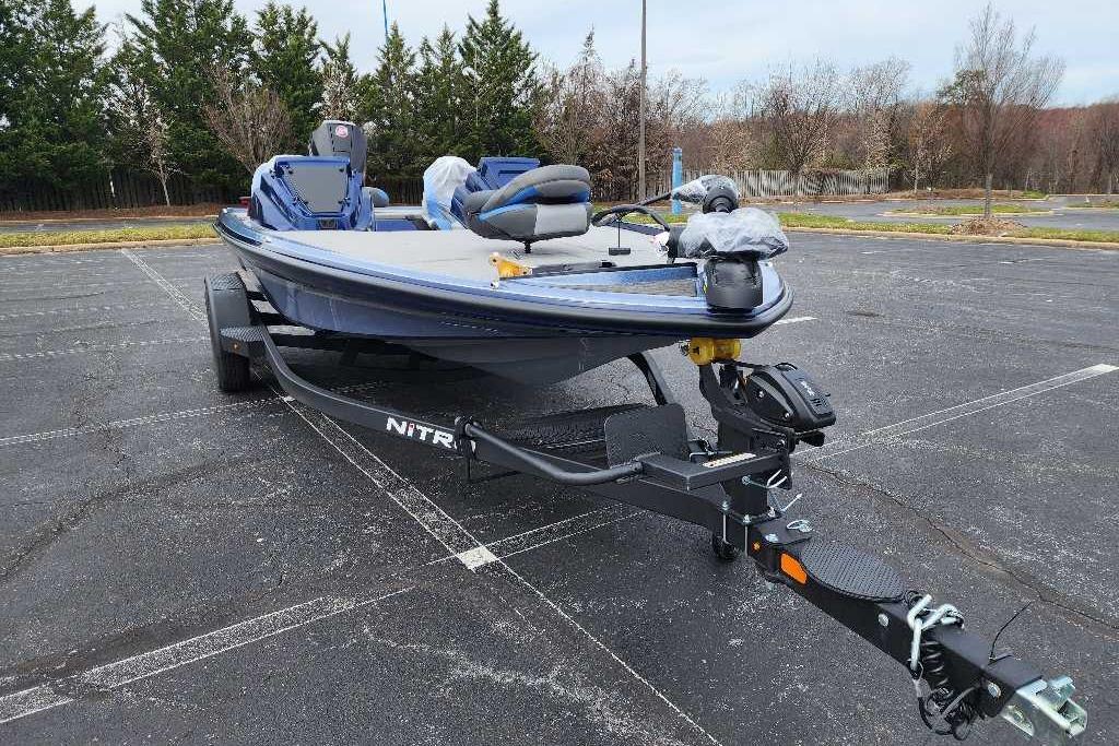 2026 Nitro Z20 XL boat on trailer in parking lot.