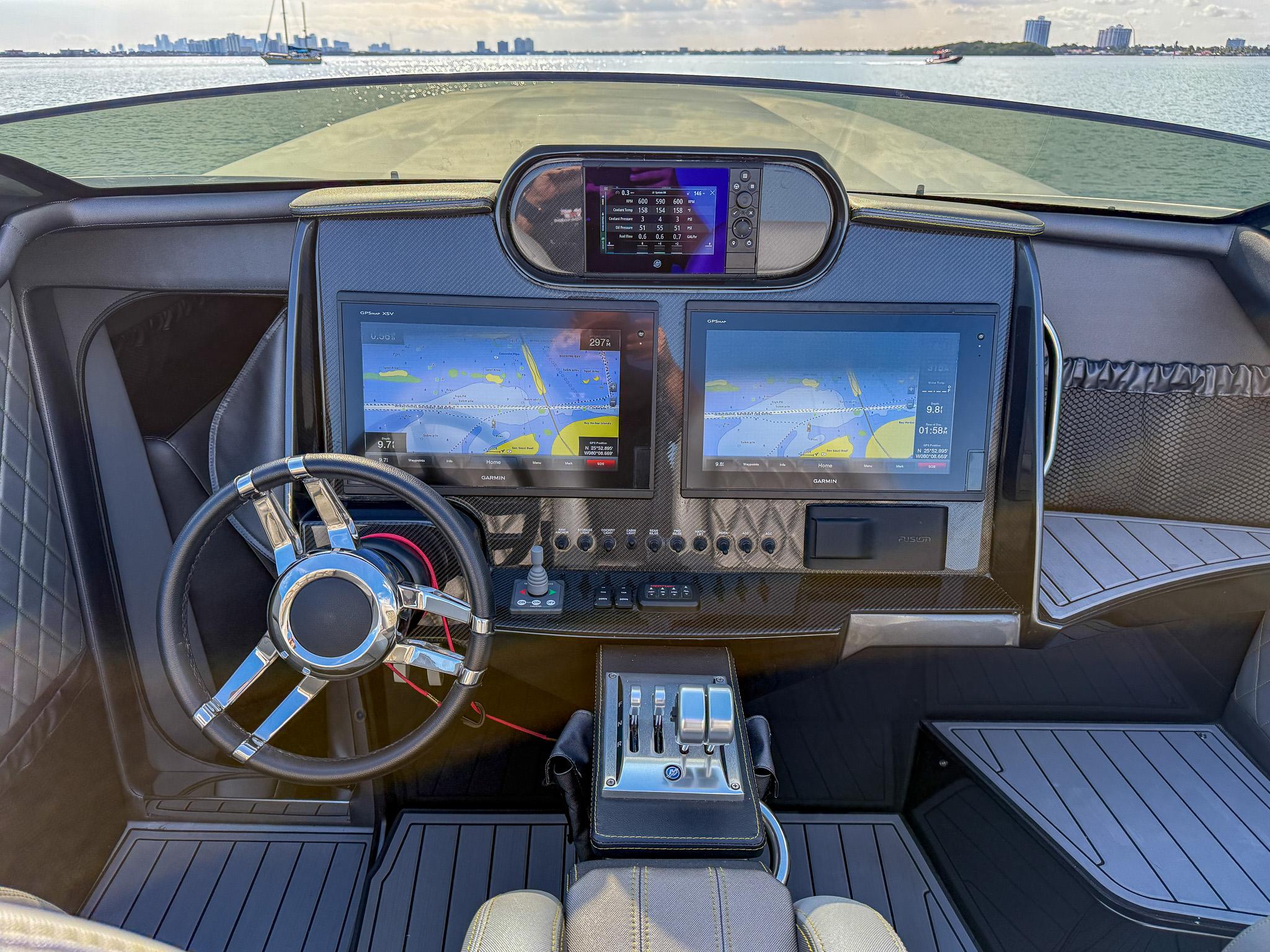 2017 Nor-Tech 3900 Super-VEE cockpit with dual navigation screens and modern steering wheel.