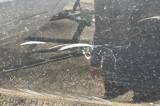Scratched surface on 2021 Chaparral 21 SSi boat hull, showing wear and damage.