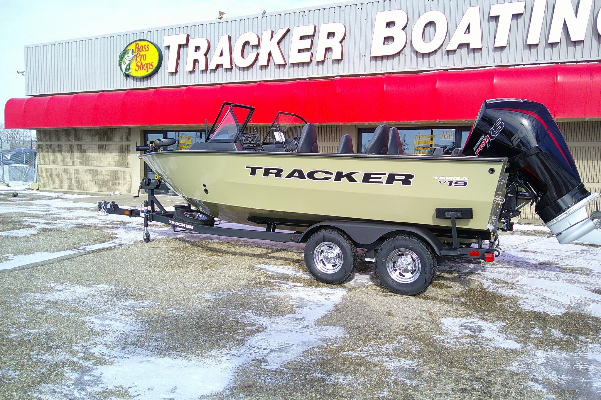 2026 Tracker Targa V-19 Combo boat on trailer outside Bass Pro Shops.
