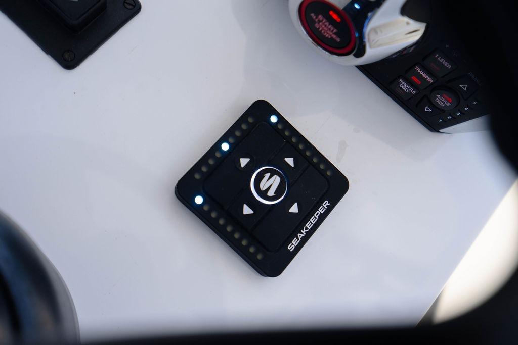 Control panel of a 2027 Reef Runner 340 boat featuring Seakeeper stabilization system.